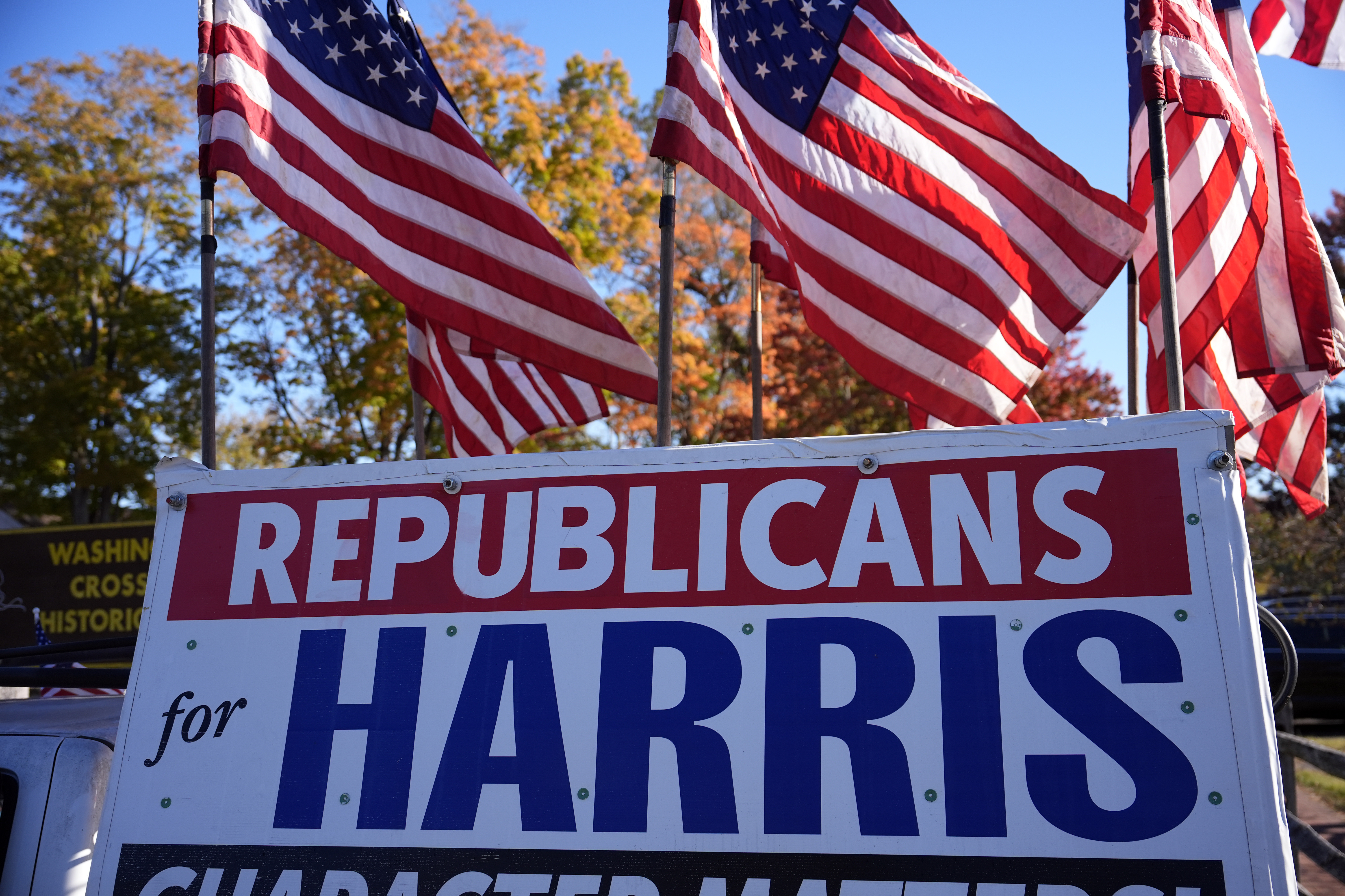 A 'Republicans for Harris" sign is seen before Democratic presidential nominee Vice President Kamala Harris speaks at a campaign event at Washington Crossing Historic Park, Wednesday, Oct. 16, 2024, in Washington Crossing, Pa. (AP Photo/Matt Slocum)