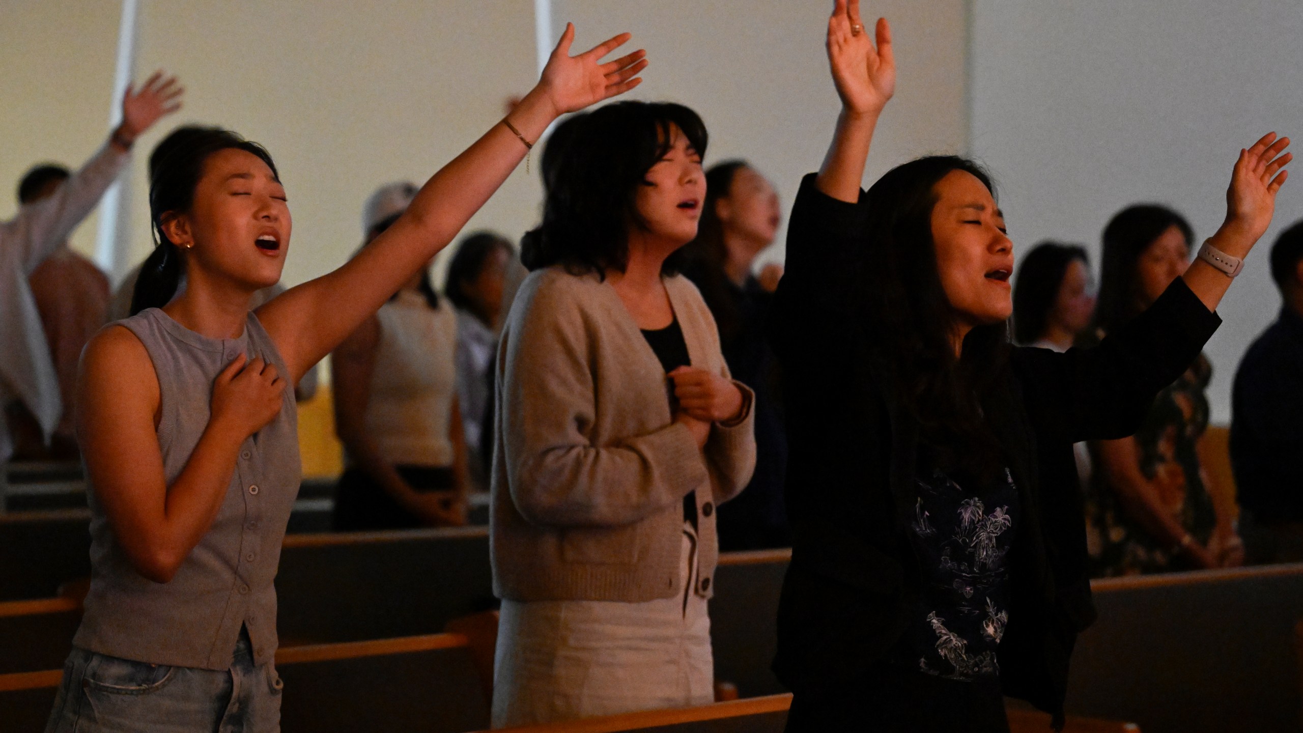 Parishioners pray during a service at the Christ Central Presbyterian Church, Sunday, Oct. 13, 2024 in Centreville. (AP Photo/John McDonnell)