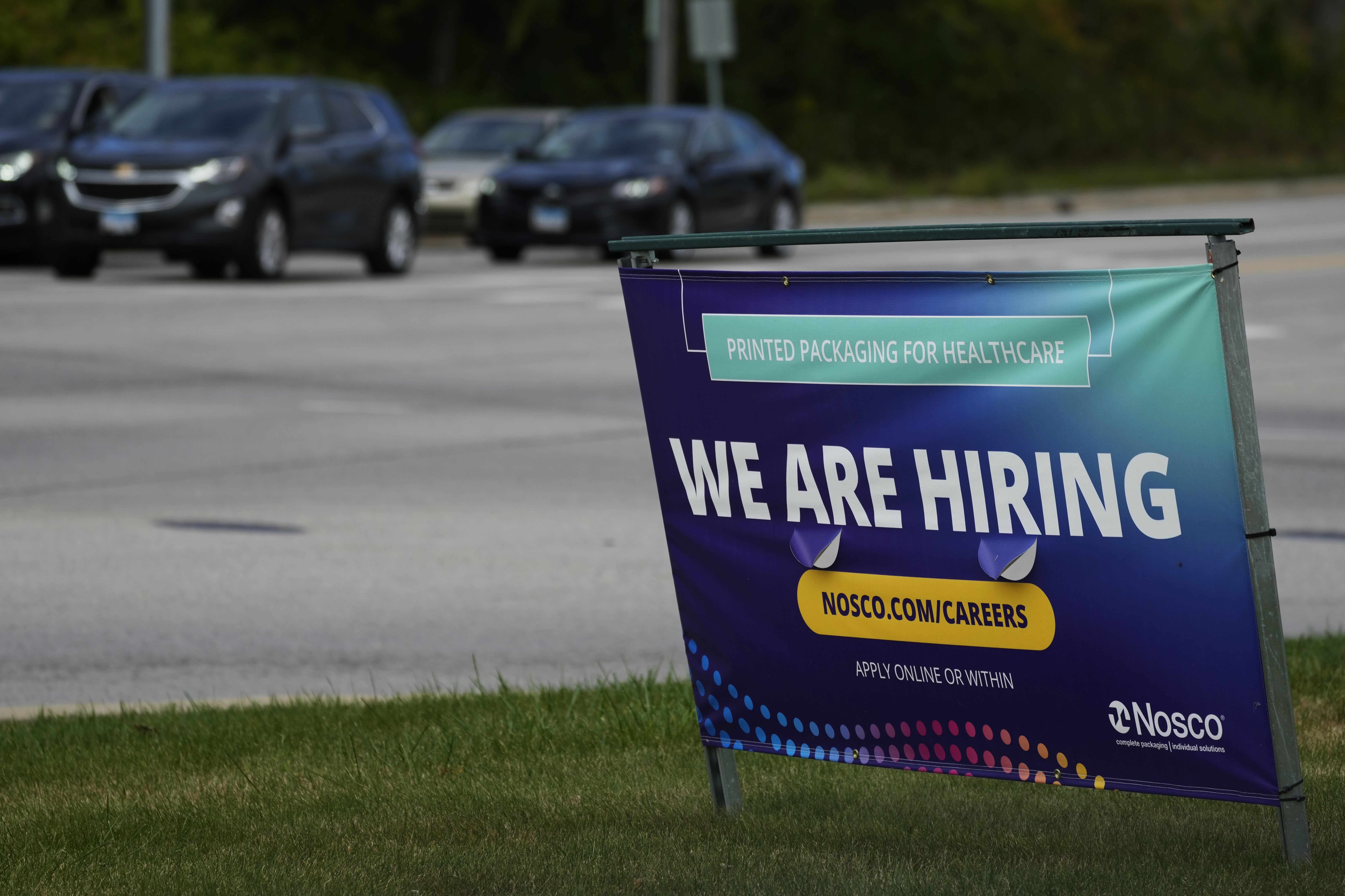 FILE - A hiring sign is seen in Waukegan, Ill., on Sept. 28, 2024. (AP Photo/Nam Y. Huh, File)