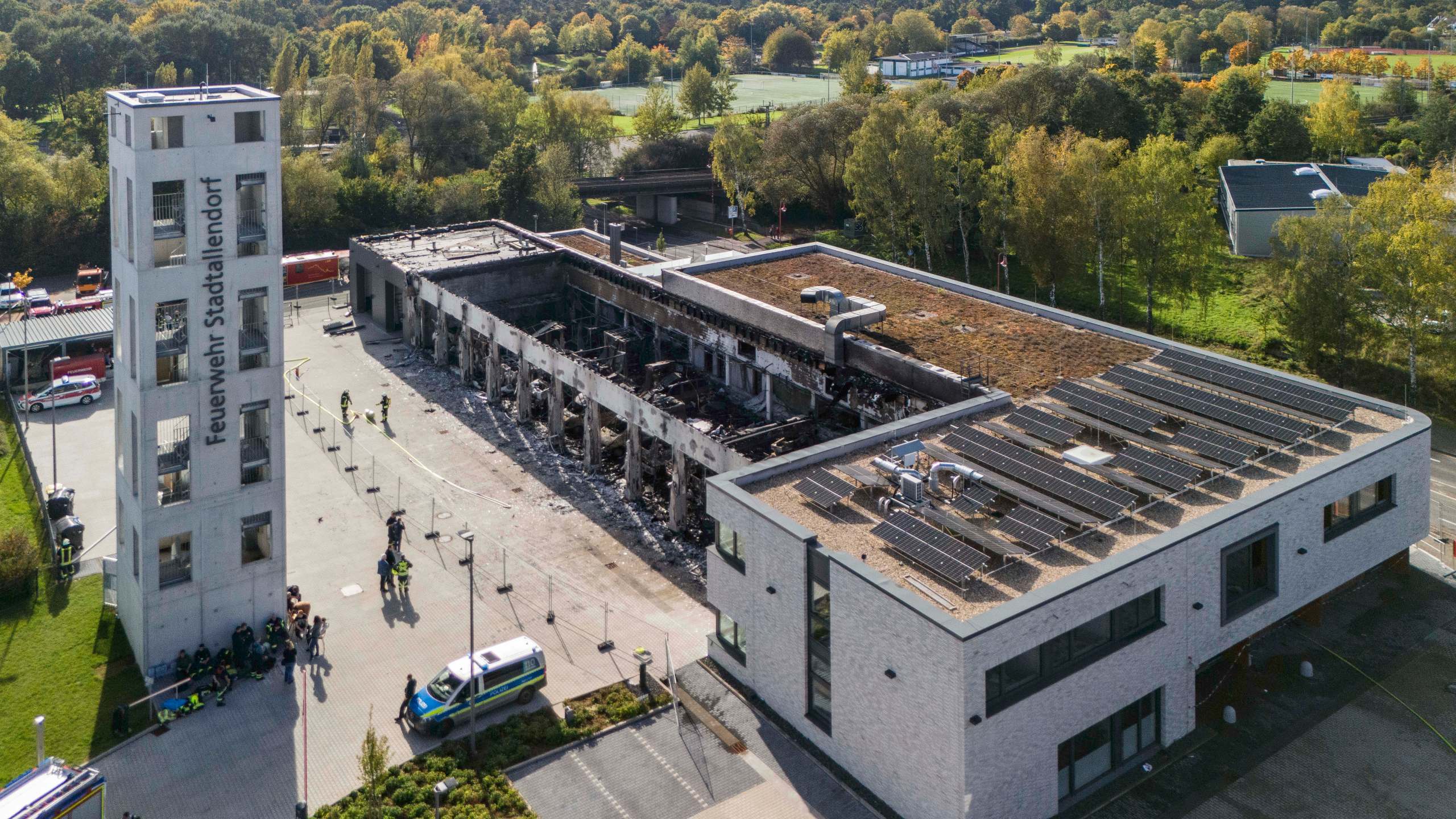 Firefighters work on the site of a fire in a vehicle depot in Stadtallendorf, Germany, Wednesday Oct. 16, 2024. (Andreas Arnold/dpa via AP)