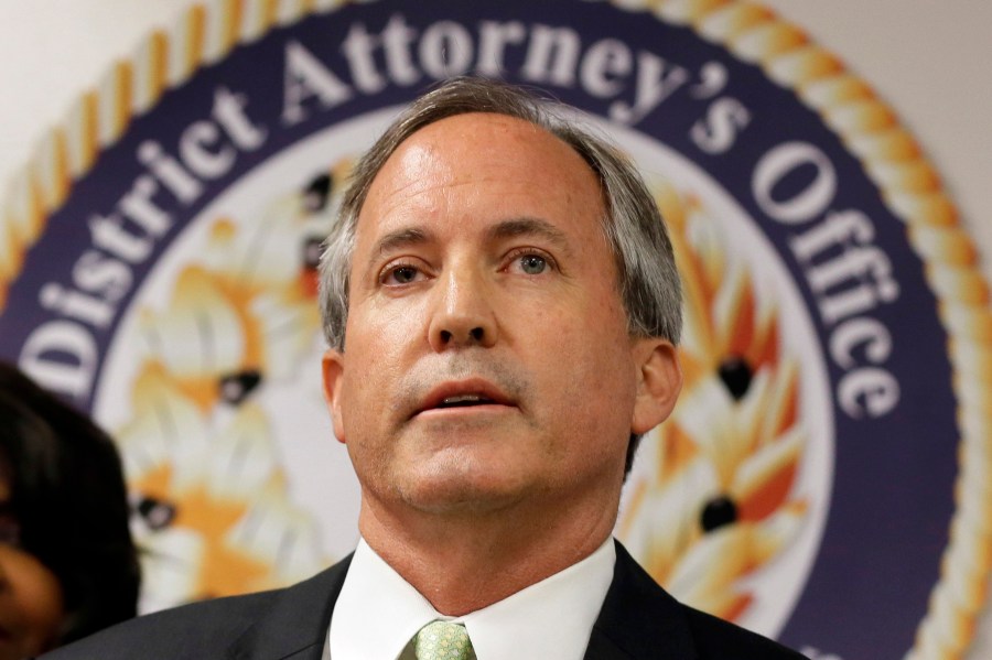 FILE - Texas Attorney General Ken Paxton speaks at a news conference in Dallas on June 22, 2017. (AP Photo/Tony Gutierrez, File)