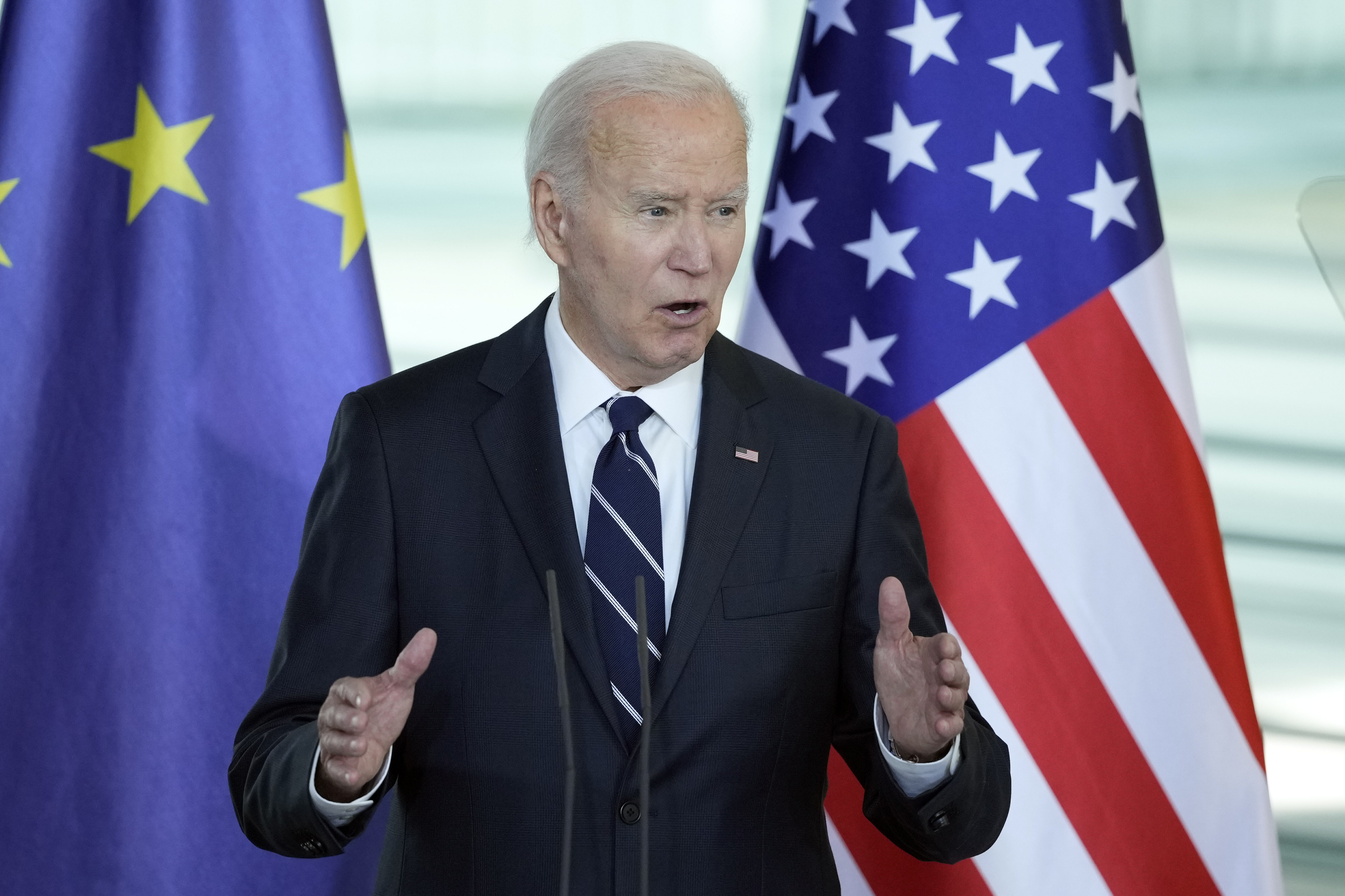 President Joe Biden talks to the media during a joint statement to the press with German Chancellor Olaf Scholz at the Chancellery in Berlin, Germany, Friday, Oct. 18, 2024. (AP Photo/Ebrahim Noroozi)