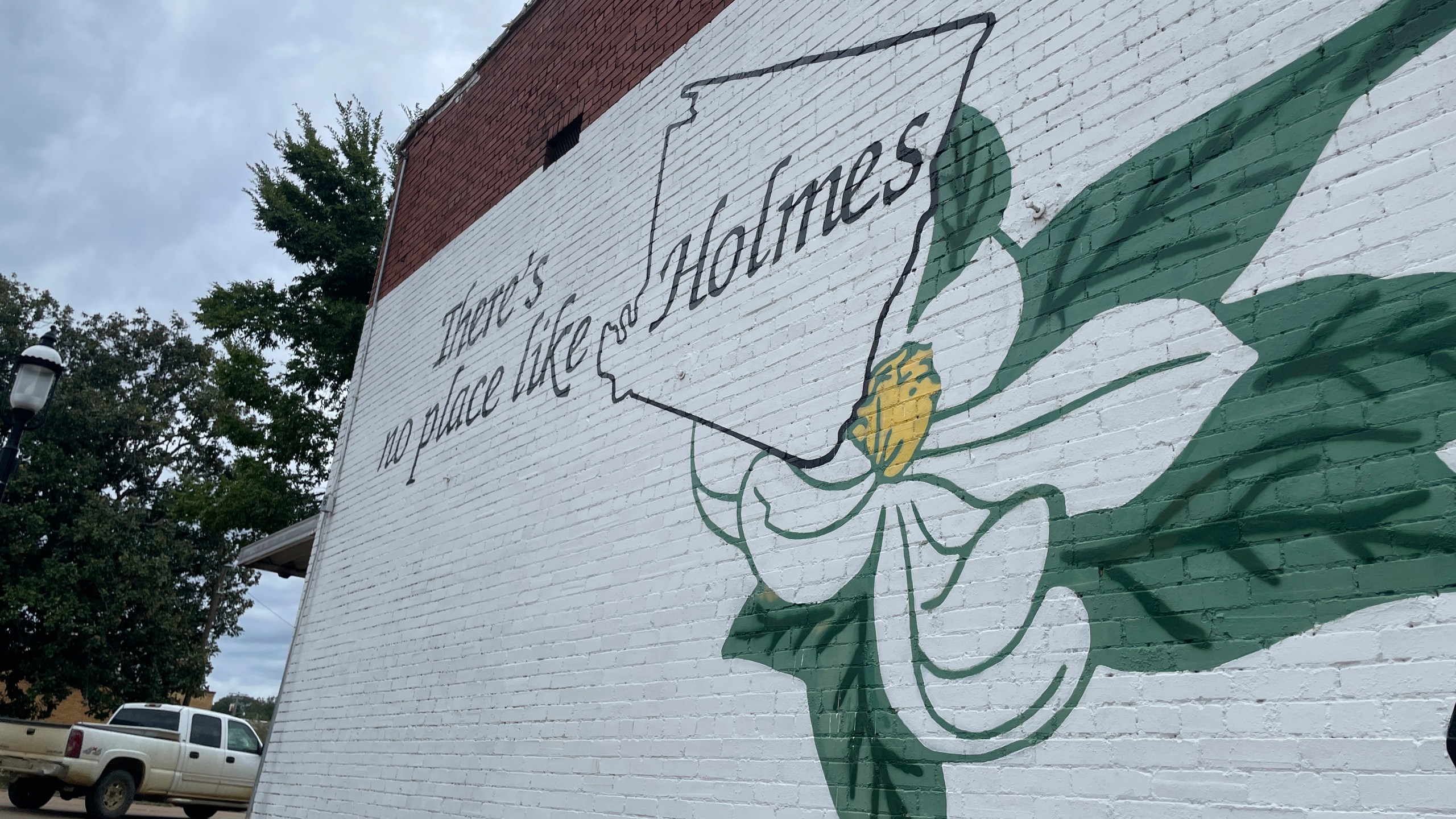 A mural promoting Holmes County, Mississippi, is shown in the side of a building in downtown Lexington, Miss., on Friday, Sept. 27, 2024. (AP Photo/Emily Wagster Pettus)