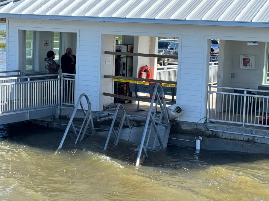 A portion of the gangway which collapsed Saturday afternoon remains visible on Sapelo Island in McIntosh county, Ga., Sunday, Oct. 20, 2024. (AP Photo/Lewis Levine)