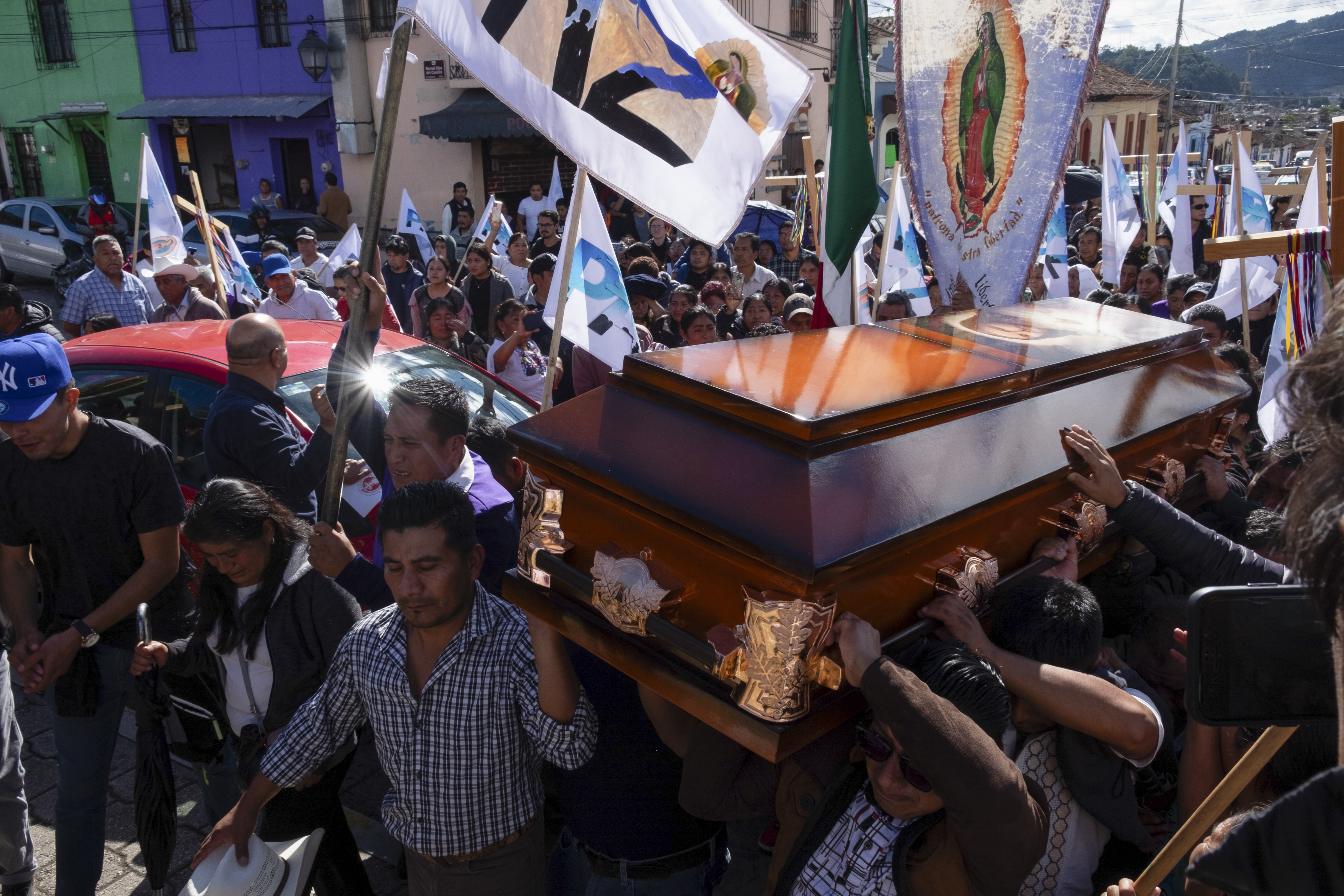 People carry the coffin of Catholic priest Marcelo Perez, who was killed in San Cristobal de las Casas, Chiapas state, Mexico, Sunday, Oct. 20, 2024. (AP Photo/Isabel Mateos)