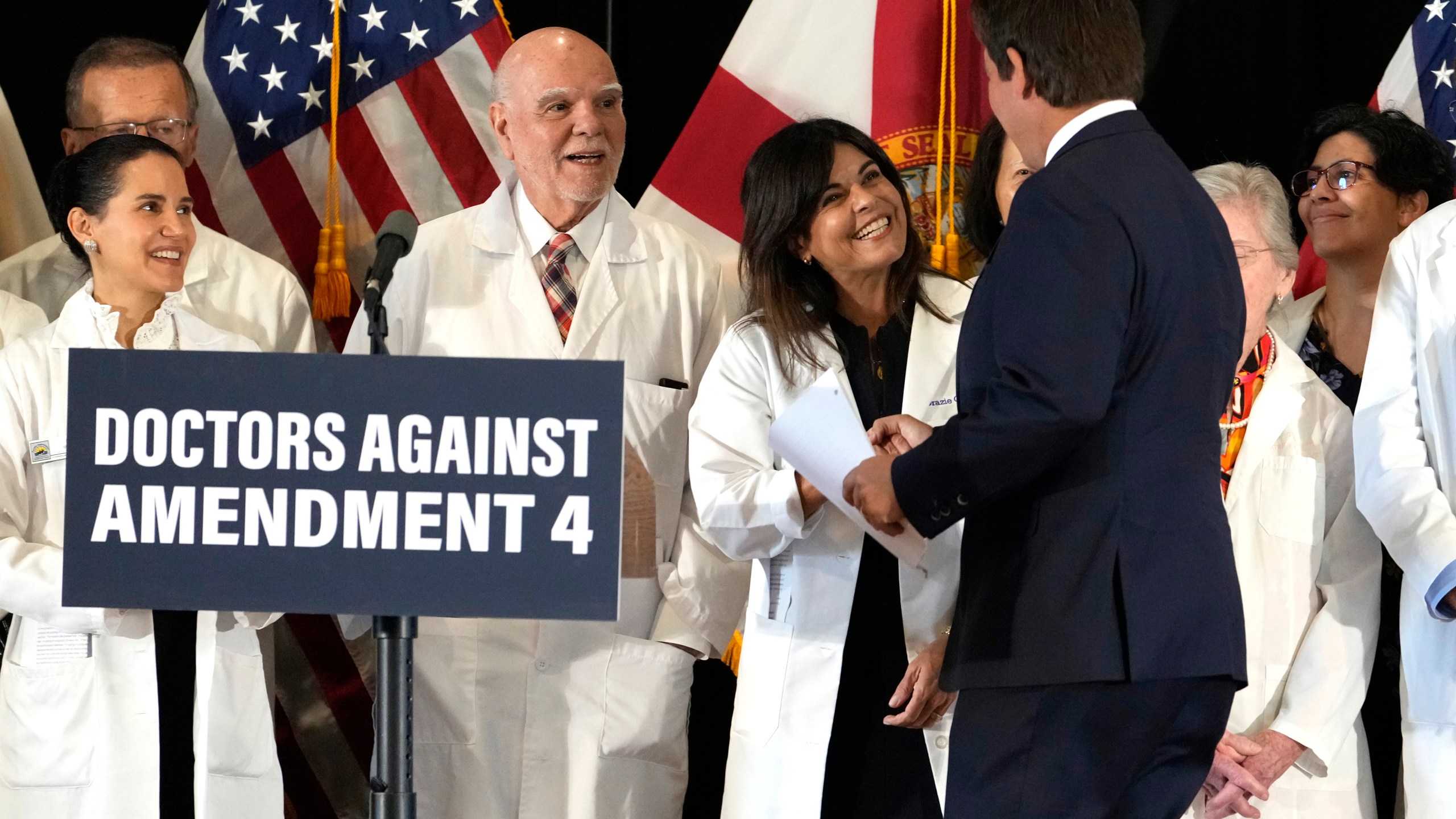 Florida Gov. Ron DeSantis, arrives on stage to speak out against Amendment 4 which would protect access to abortion during a news conference with Florida Physicians Against Amendment 4 Monday, Oct. 21, 2024, in Coral Gables, Fla. (AP Photo/Lynne Sladky)