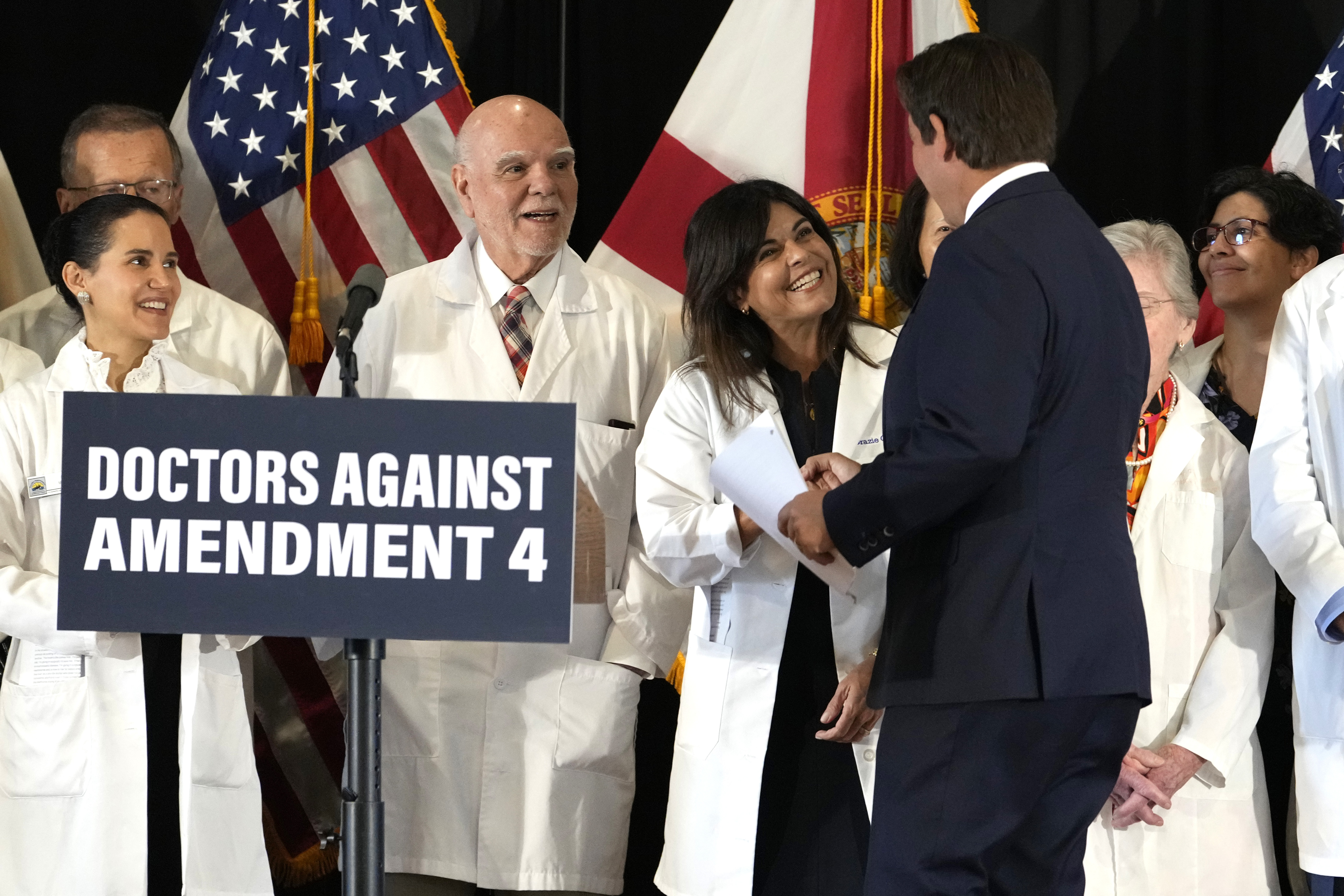 Florida Gov. Ron DeSantis, arrives on stage to speak out against Amendment 4 which would protect access to abortion during a news conference with Florida Physicians Against Amendment 4 Monday, Oct. 21, 2024, in Coral Gables, Fla. (AP Photo/Lynne Sladky)