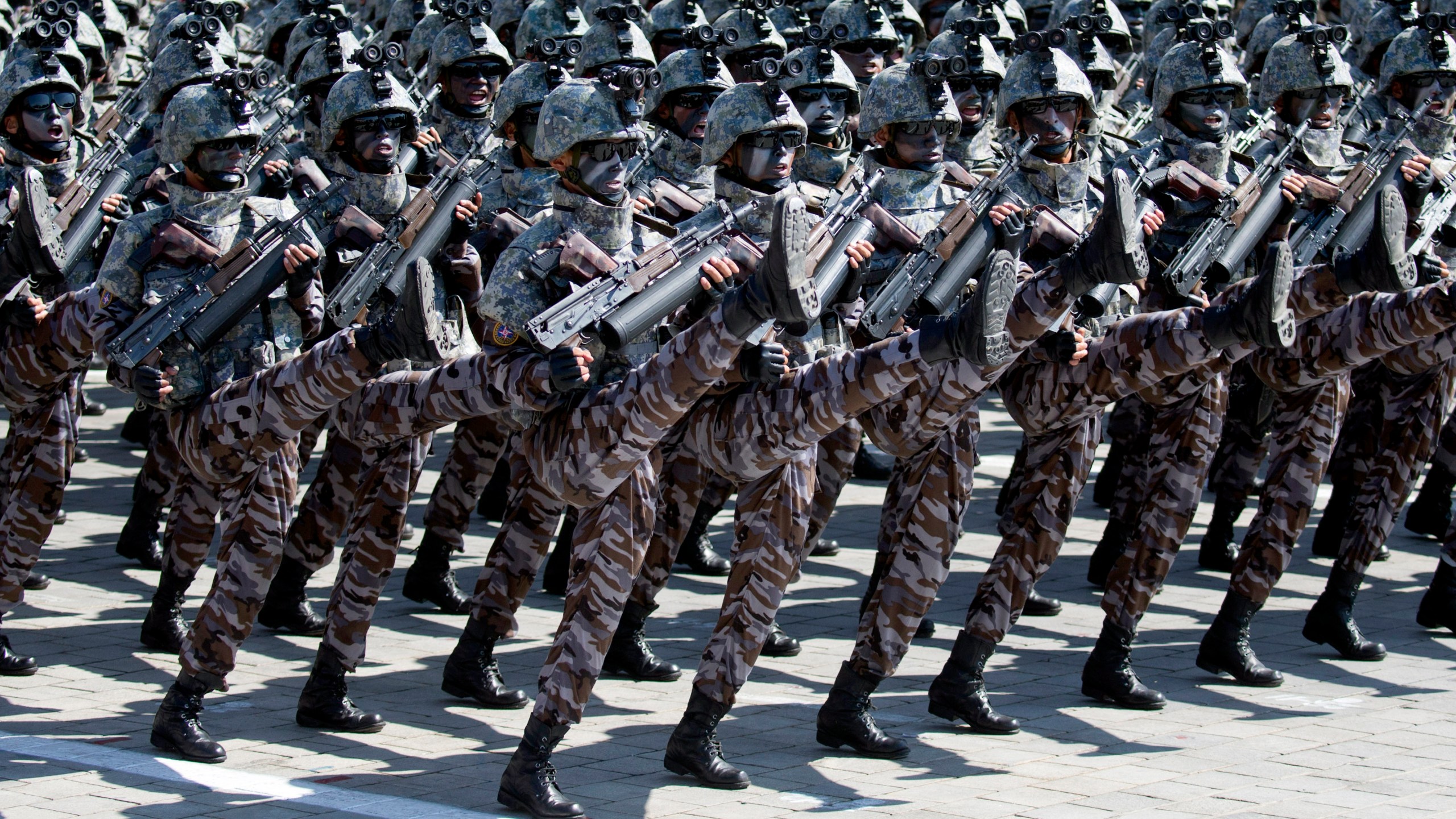 FILE - Soldiers march in a parade for the 70th anniversary of North Korea's founding day in Pyongyang, North Korea, on Sept. 9, 2018. (AP Photo/Ng Han Guan, File)