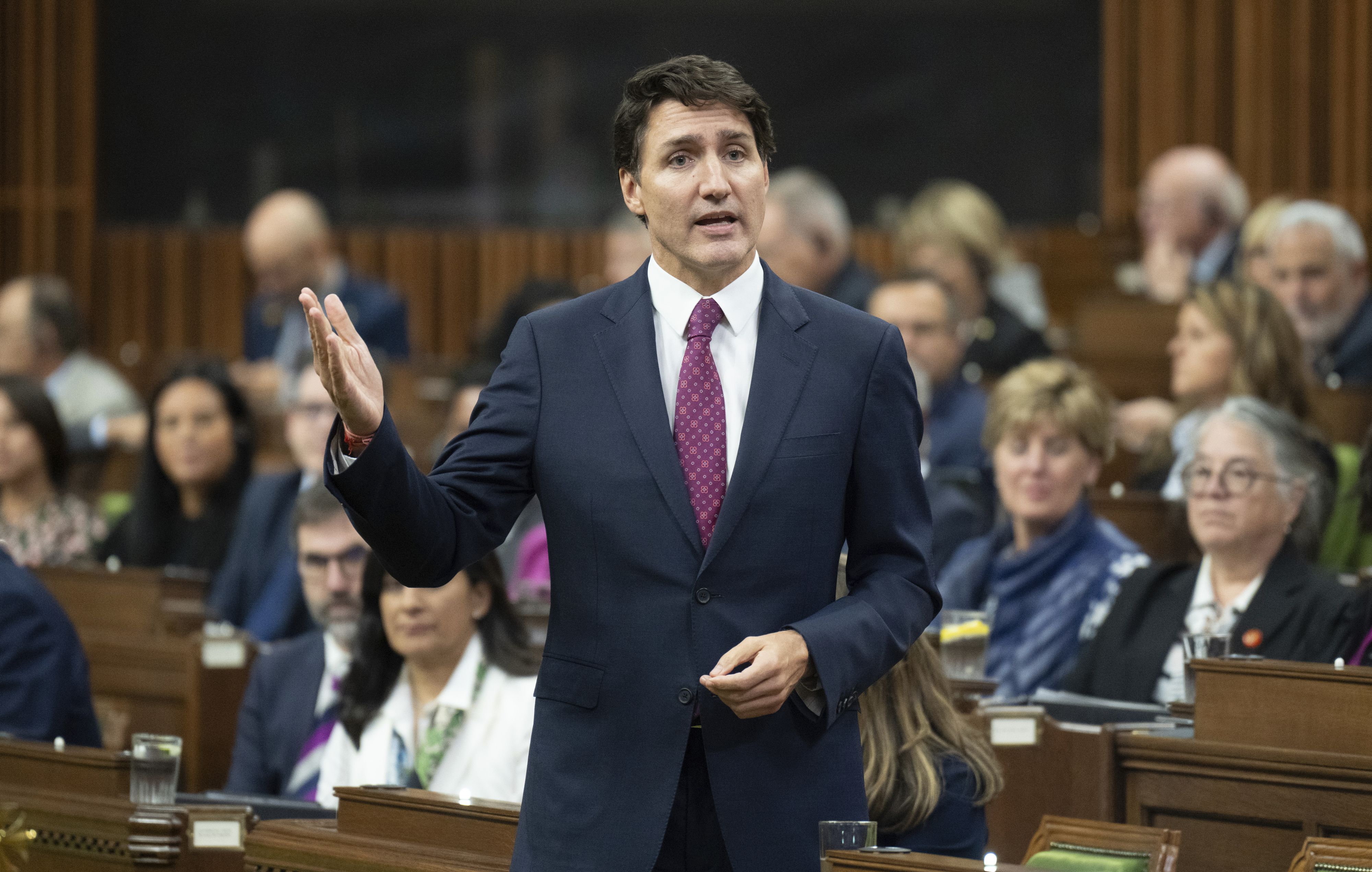 Canada Prime Minister Justin Trudeau rises during Question Period in Ottawa, Tuesday, Oct. 22, 2024. (Adrian Wyld/The Canadian Press via AP)