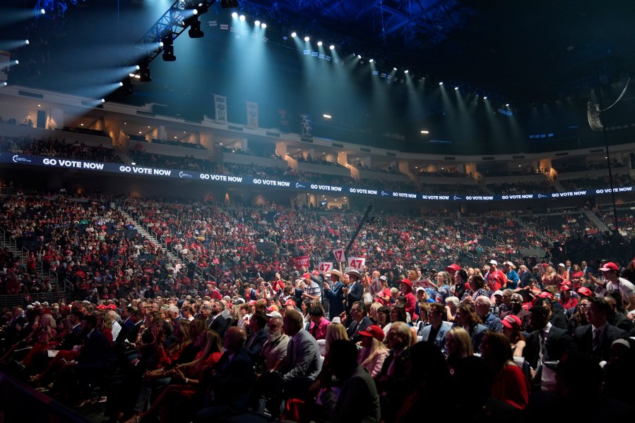 Supporters listen during a campaign rally with Republican presidential nominee former President Donald Trump Wednesday, Oct. 23, 2024, in Duluth, Ga. (AP Photo/Alex Brandon)