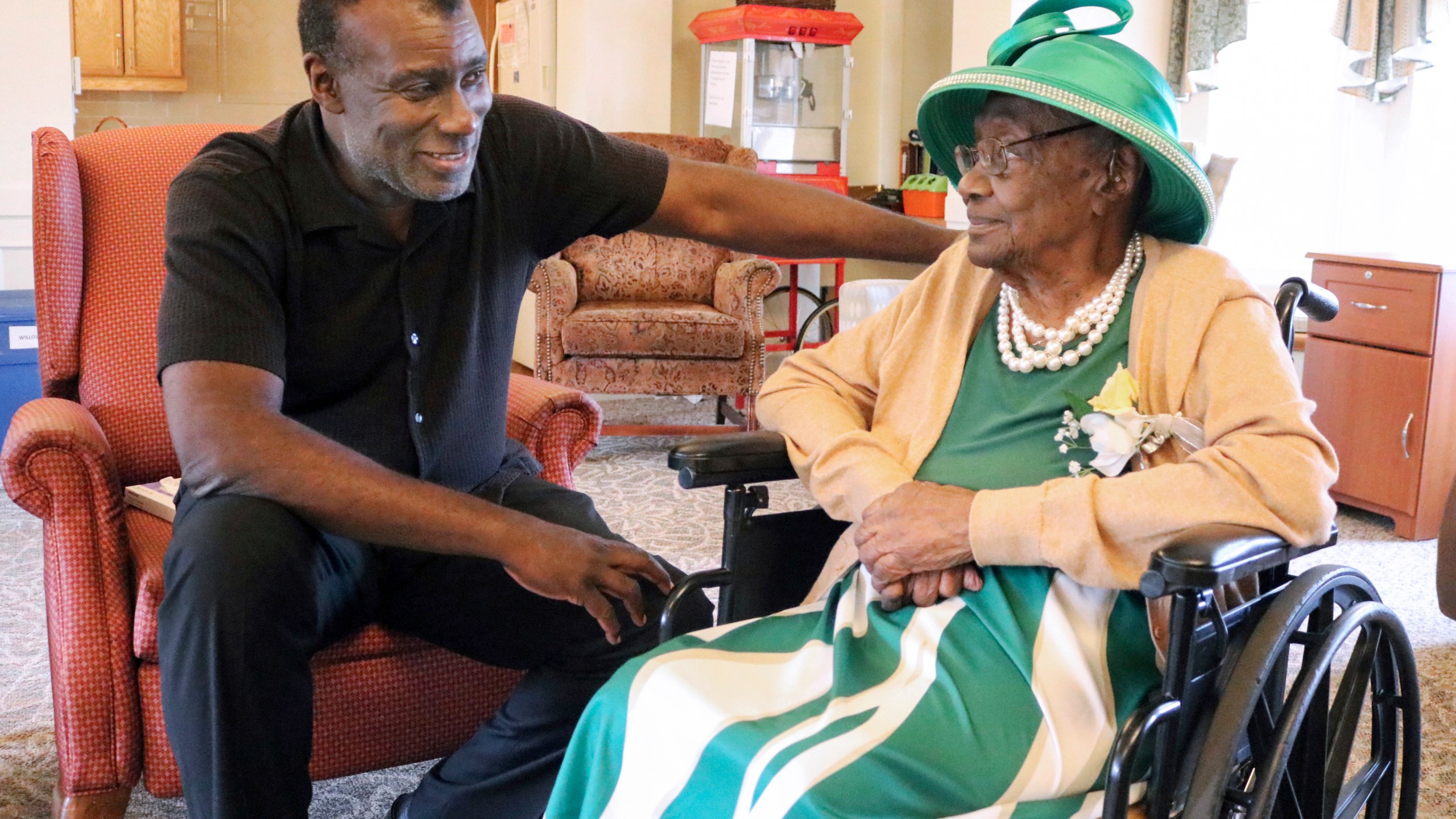 Dan Whitehead chats with his grandmother, Naomi Whitehead, at St. Paul's Senior Living Community in West Salem Township, Pa., in Sept. 2023. (Michael Roknick/The Herald via AP)