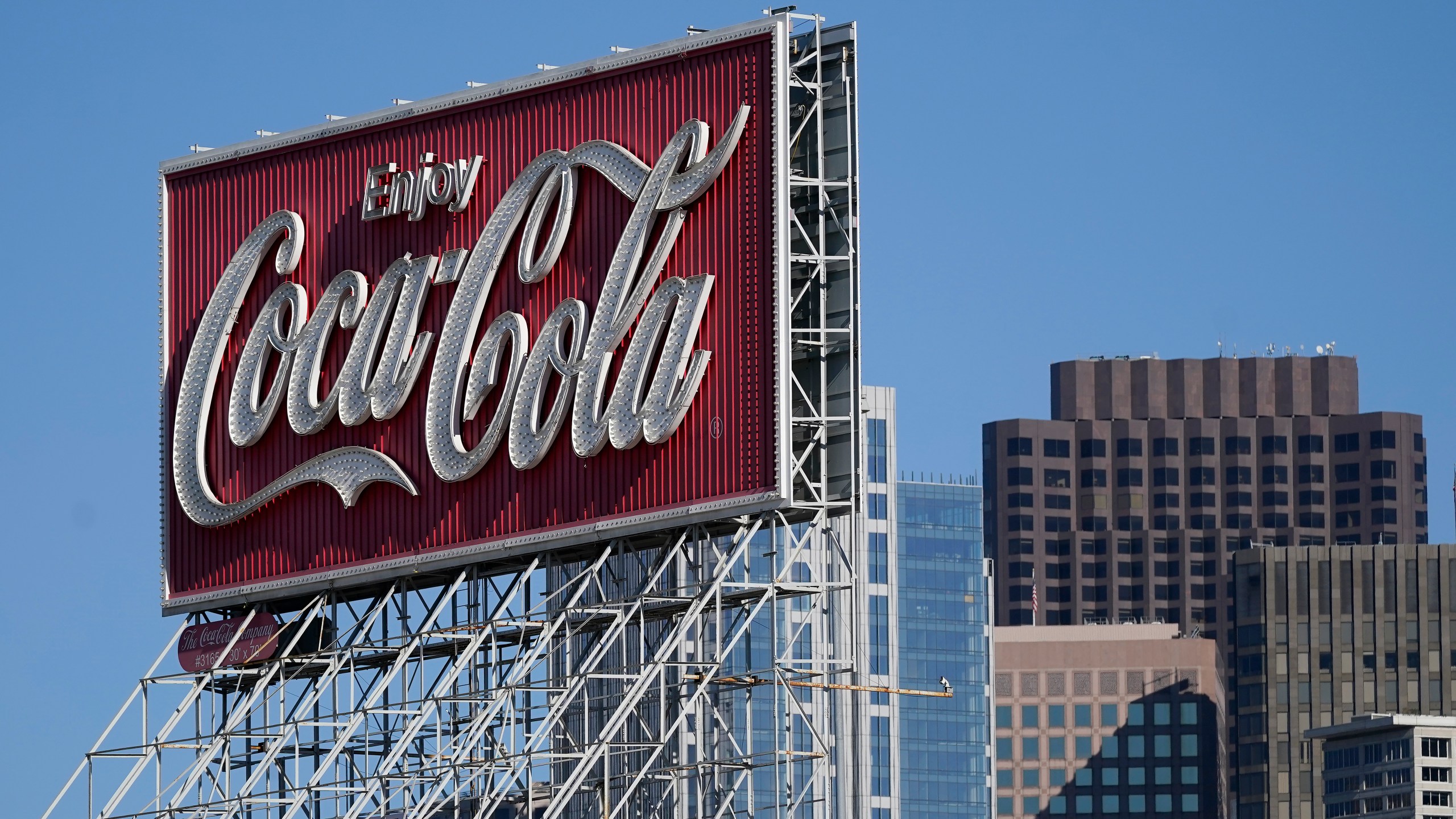 FILE - A Coca-Cola sign is shown in San Francisco, Tuesday, Oct. 27, 2020. (AP Photo/Jeff Chiu,File)