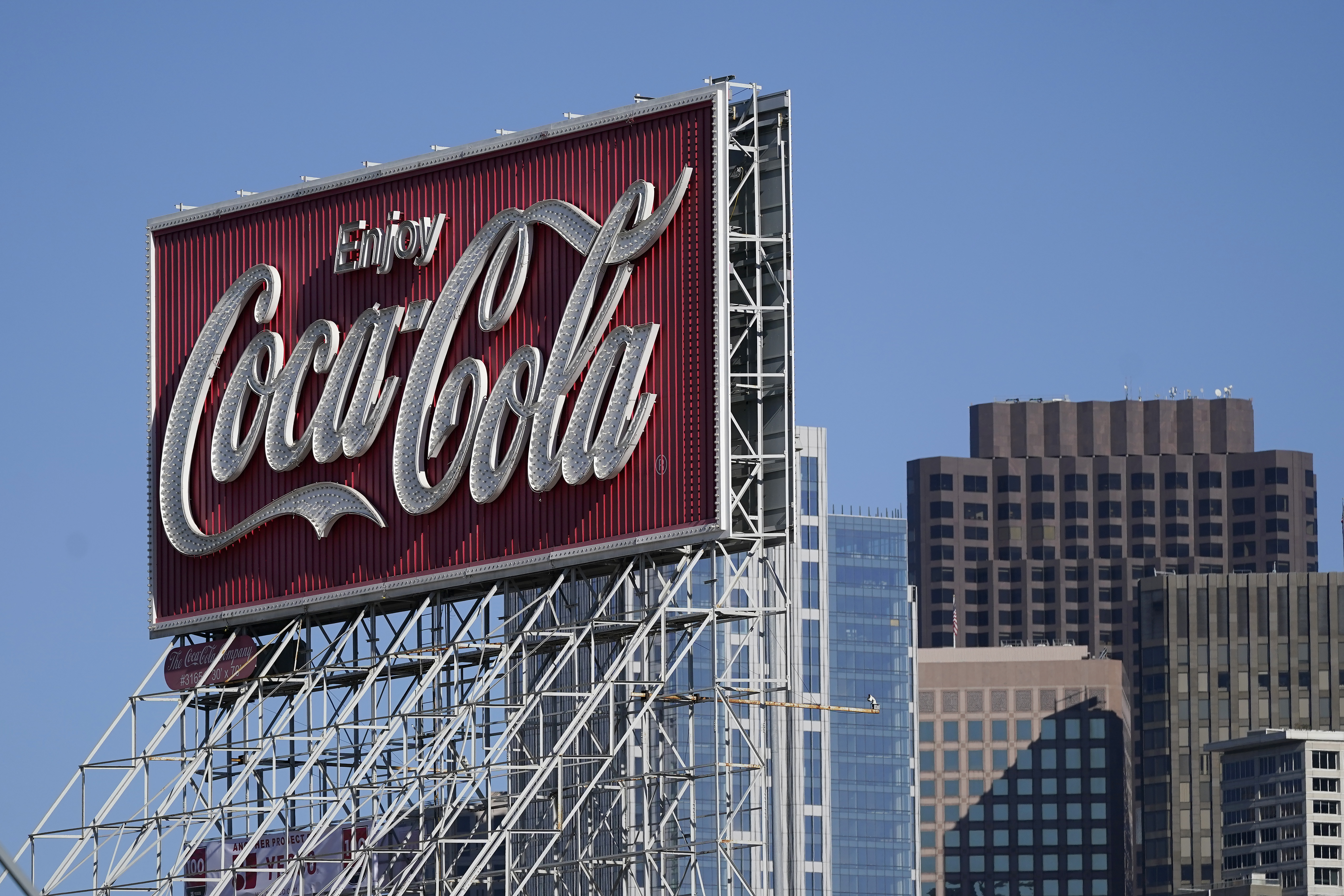 FILE - A Coca-Cola sign is shown in San Francisco, Tuesday, Oct. 27, 2020. (AP Photo/Jeff Chiu,File)