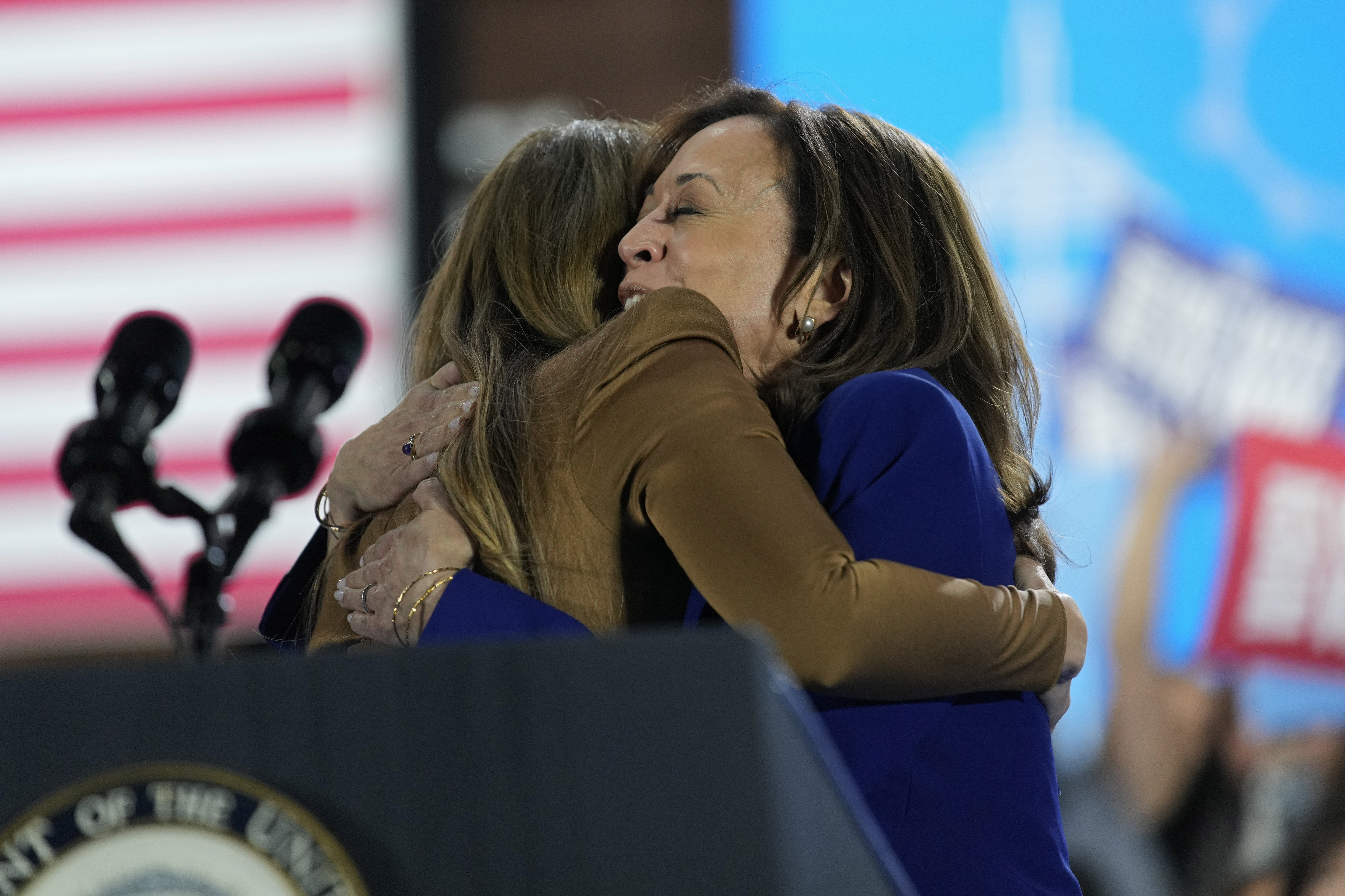 Jennifer Lopez, left, hugs Democratic presidential nominee Vice President Kamala Harris during a campaign rally Thursday, Oct. 31, 2024, in North Las Vegas, Nev. (AP Photo/John Locher)