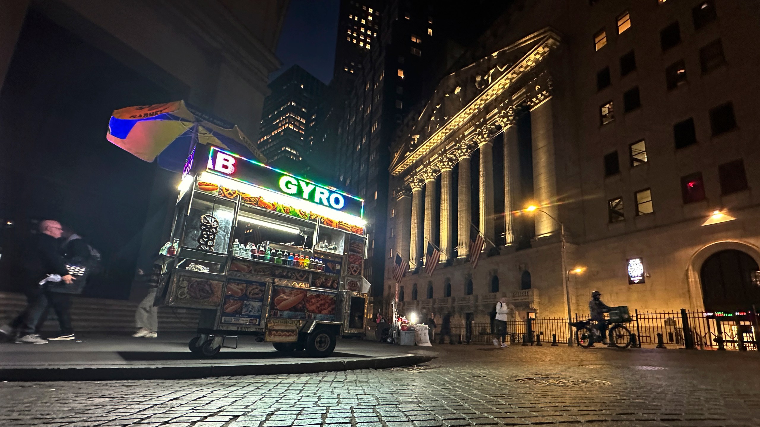 A food vendor's cart is parked across from the New York Stock Exchange on Wednesday, Oct. 30, 2024. (AP Photo/Peter Morgan)