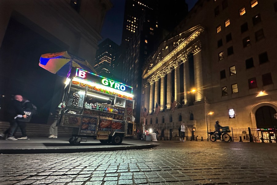 A food vendor's cart is parked across from the New York Stock Exchange on Wednesday, Oct. 30, 2024. (AP Photo/Peter Morgan)