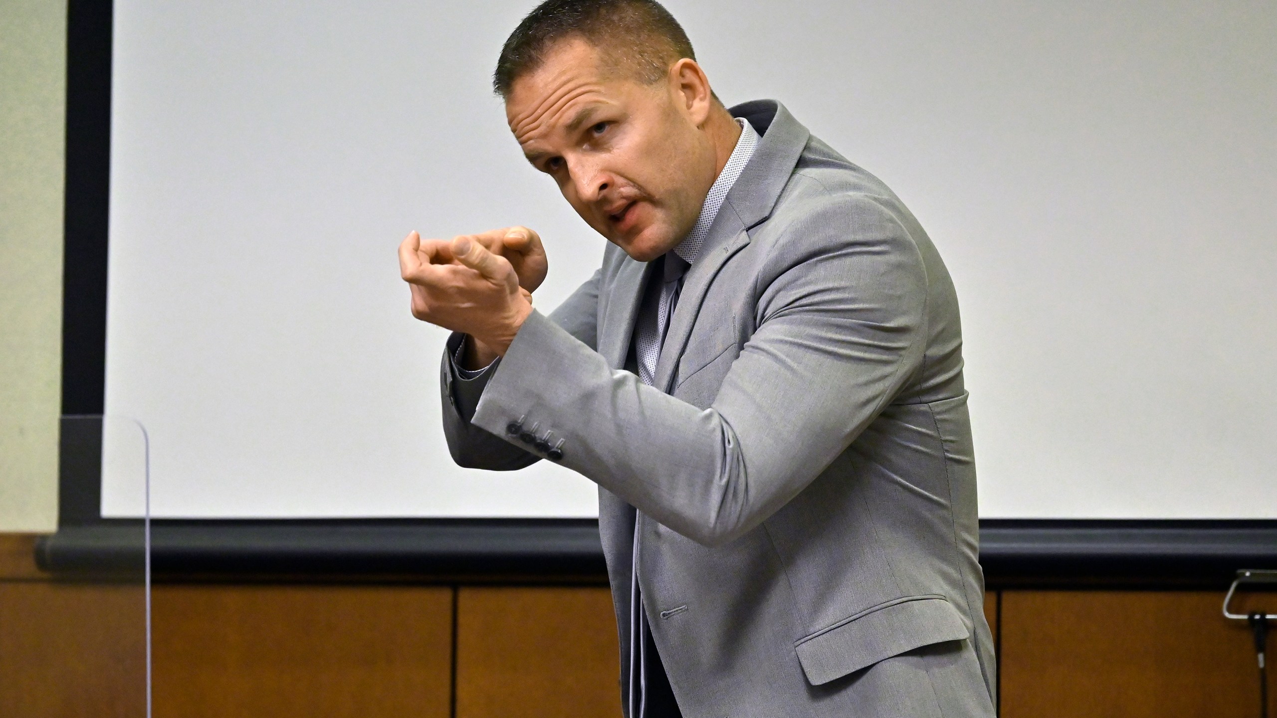 FILE - Former Louisville Police officer Brett Hankison describes what he saw in the apartment of Brionna Taylor during testimony Wednesday, March 2, 2022, in Louisville, Ky. (AP Photo/Timothy D. Easley, Pool, File)