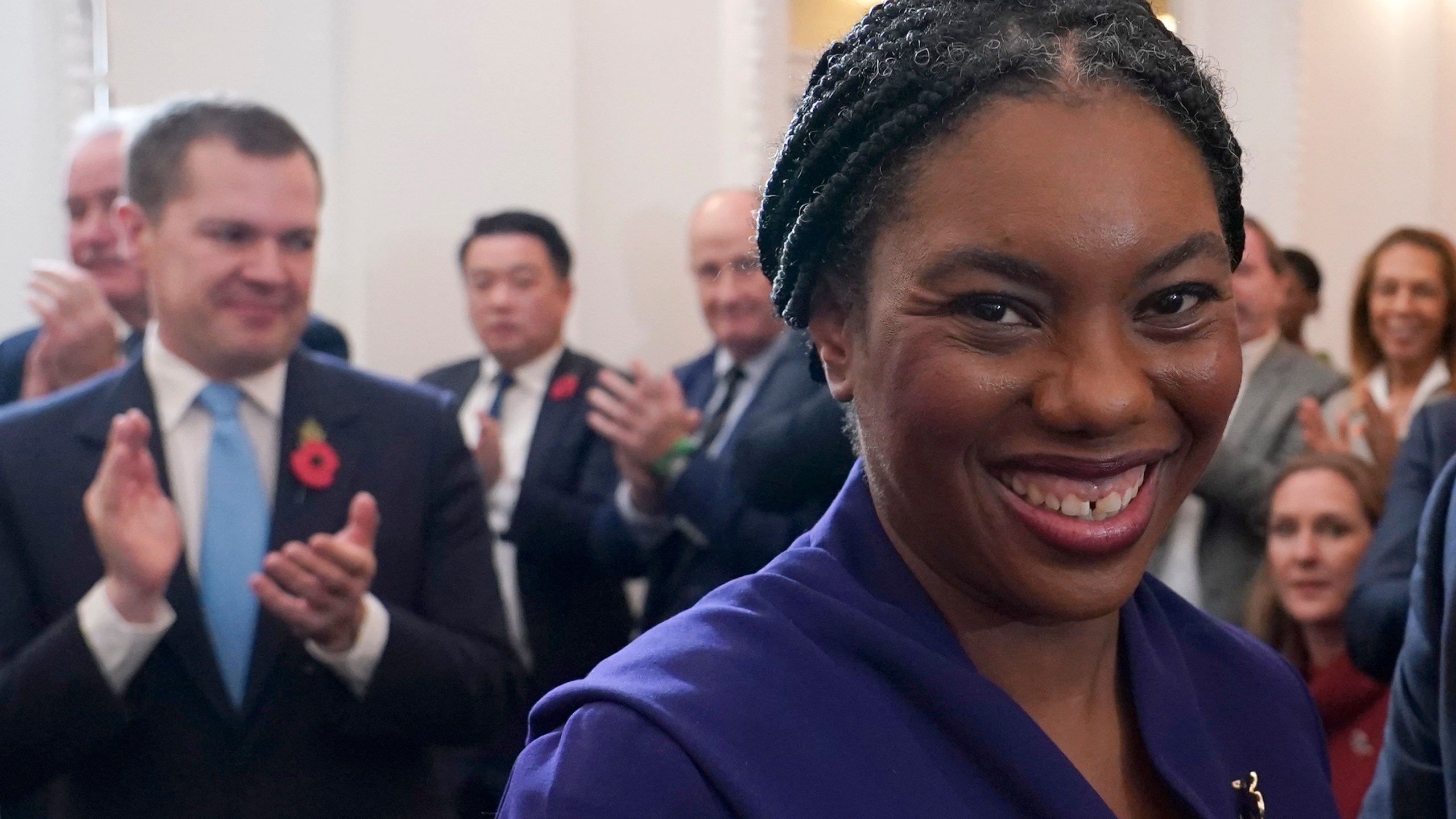 Britain's Member of Parliament Kemi Badenoch, smiles as she poses for the media after being elected as the new leader of the opposition Conservative Party, in London, Saturday, Nov. 2, 2024. (AP Photo/Alberto Pezzali)