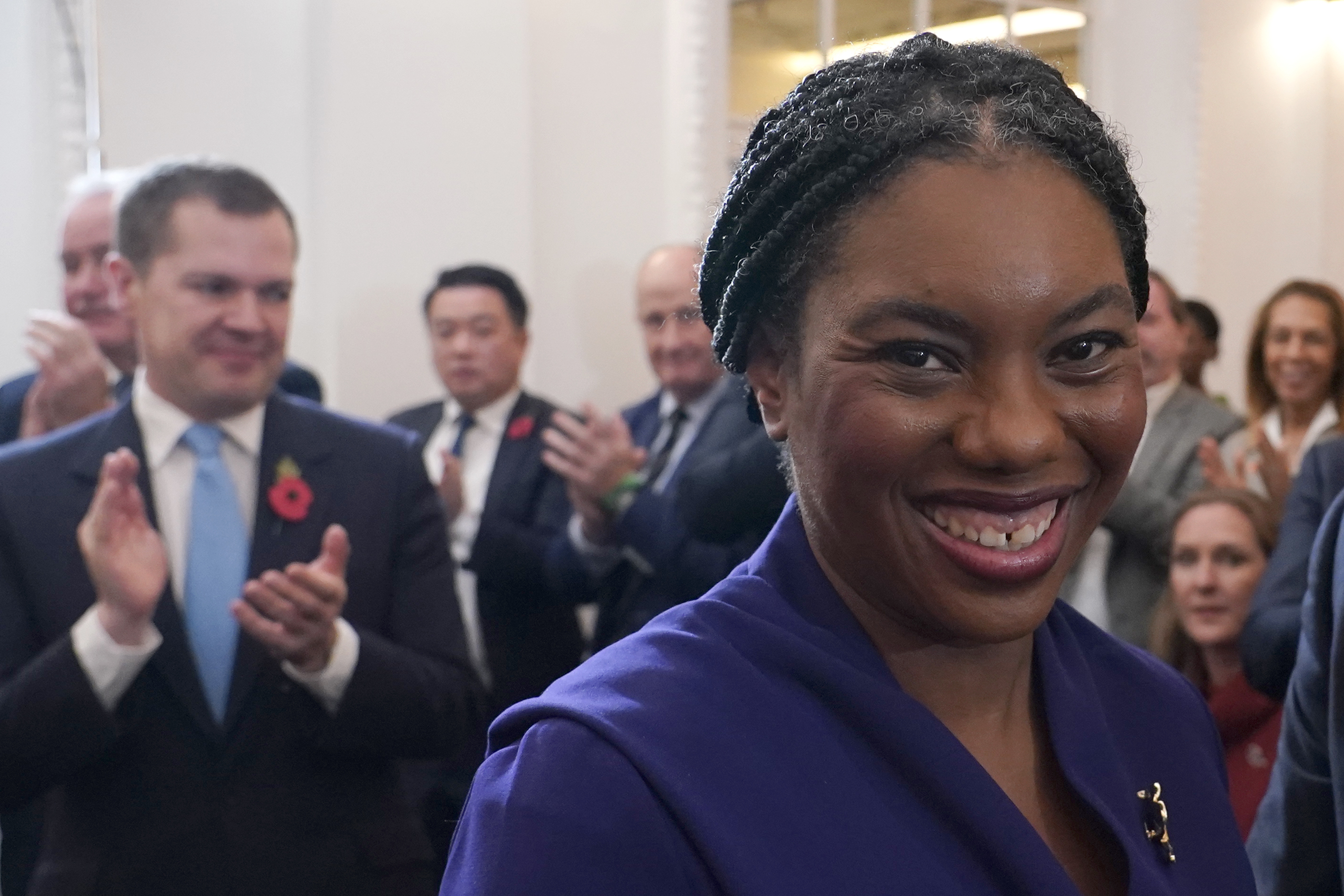 Britain's Member of Parliament Kemi Badenoch, smiles as she poses for the media after being elected as the new leader of the opposition Conservative Party, in London, Saturday, Nov. 2, 2024. (AP Photo/Alberto Pezzali)