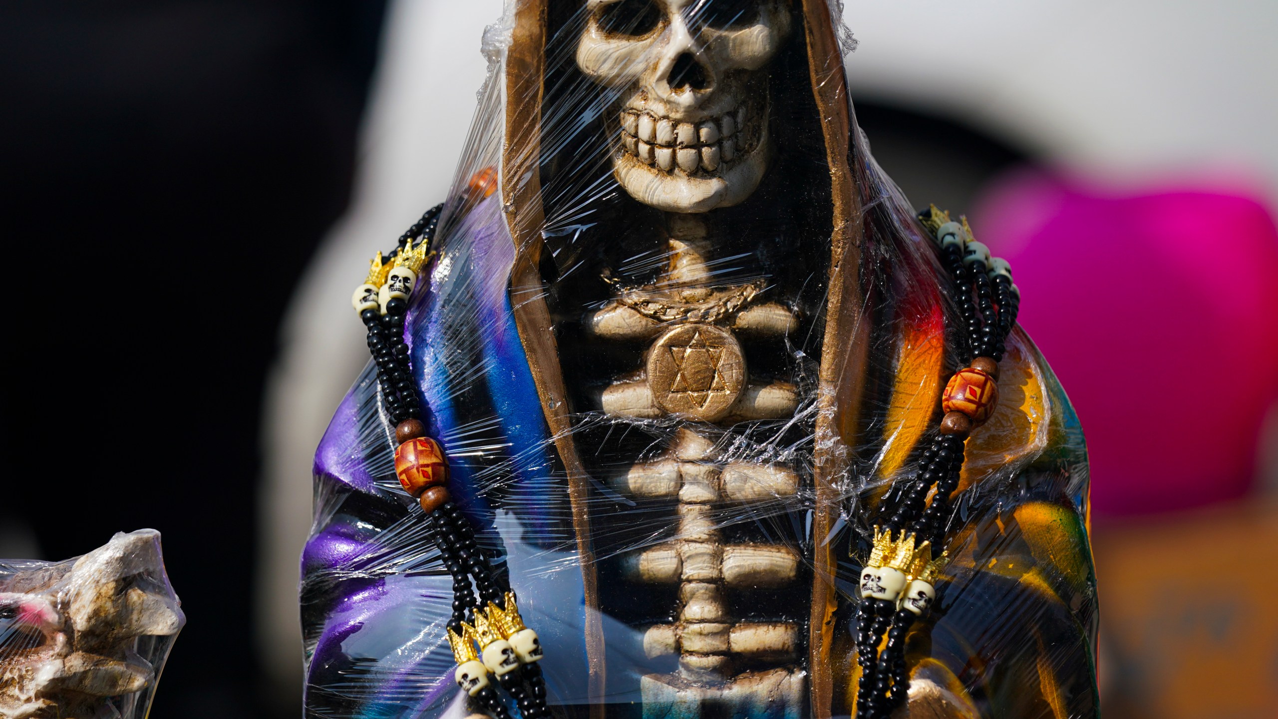 FILE - A statue of "Nuestra Señora de la Santa Muerte," or Our Lady of Holy Death, is displayed for sale in Mexico City's Tepito neighborhood, Nov. 1, 2022. (AP Photo/Fernando Llano, File)