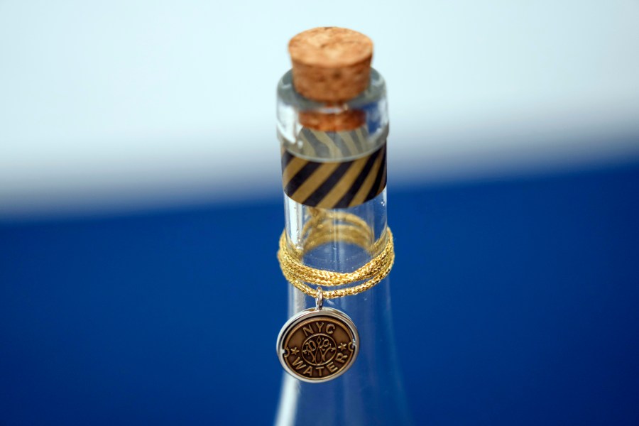 FILE - A bottle containing NYC tap water is displayed at a news conference about repairs occurring to the water supply infrastructure in New York, Sept. 30, 2024. (AP Photo/Seth Wenig, File)