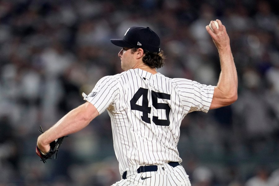 New York Yankees starting pitcher Gerrit Cole throws against the Los Angeles Dodgers during the first inning in Game 5 of the baseball World Series, Wednesday, Oct. 30, 2024, in New York. (AP Photo/Godofredo A. Vásquez)