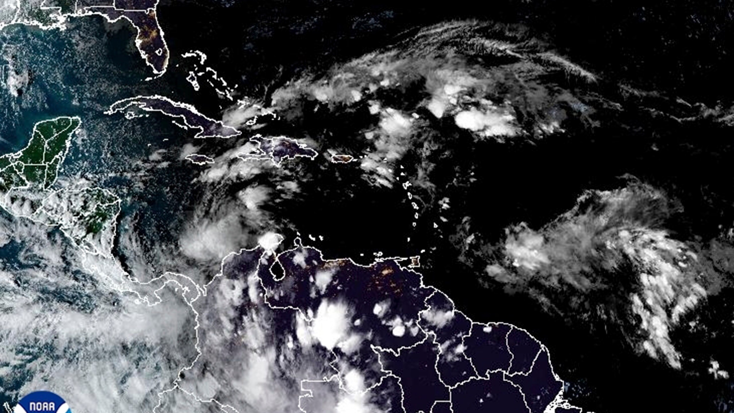 This satellite image provided by NOAA shows weather systems Sunday, Nov. 3, 2024. (NOAA via AP)