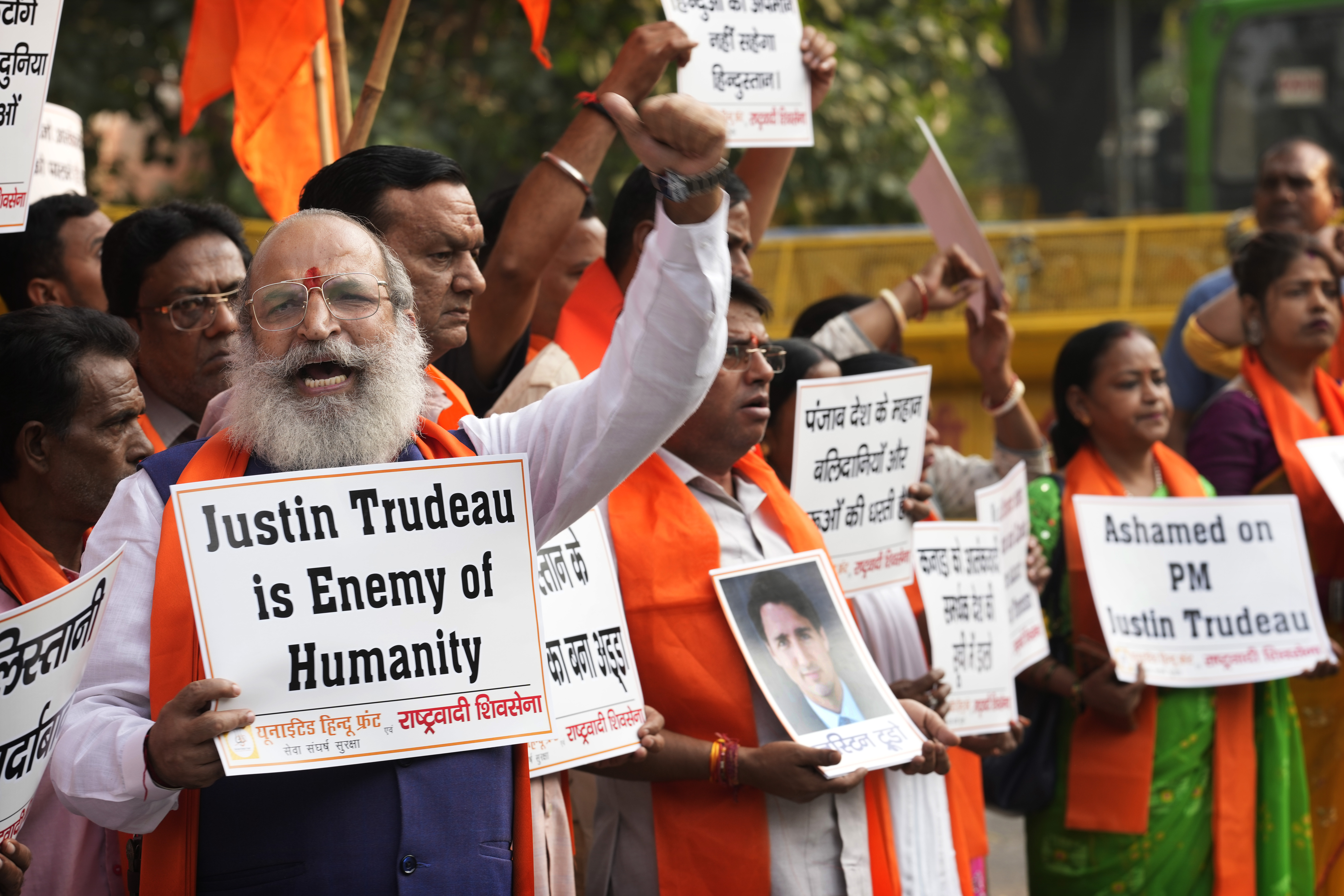 Activists of United Hindu Front, a right wing group reacting to Canada’s allegation that Indian Home Minister Amit Shah ordered the targeting of Sikh activists inside Canada, hold placards during a protest in New Delhi, India, Tuesday, Nov. 5, 2024. (AP Photo/Manish Swarup)