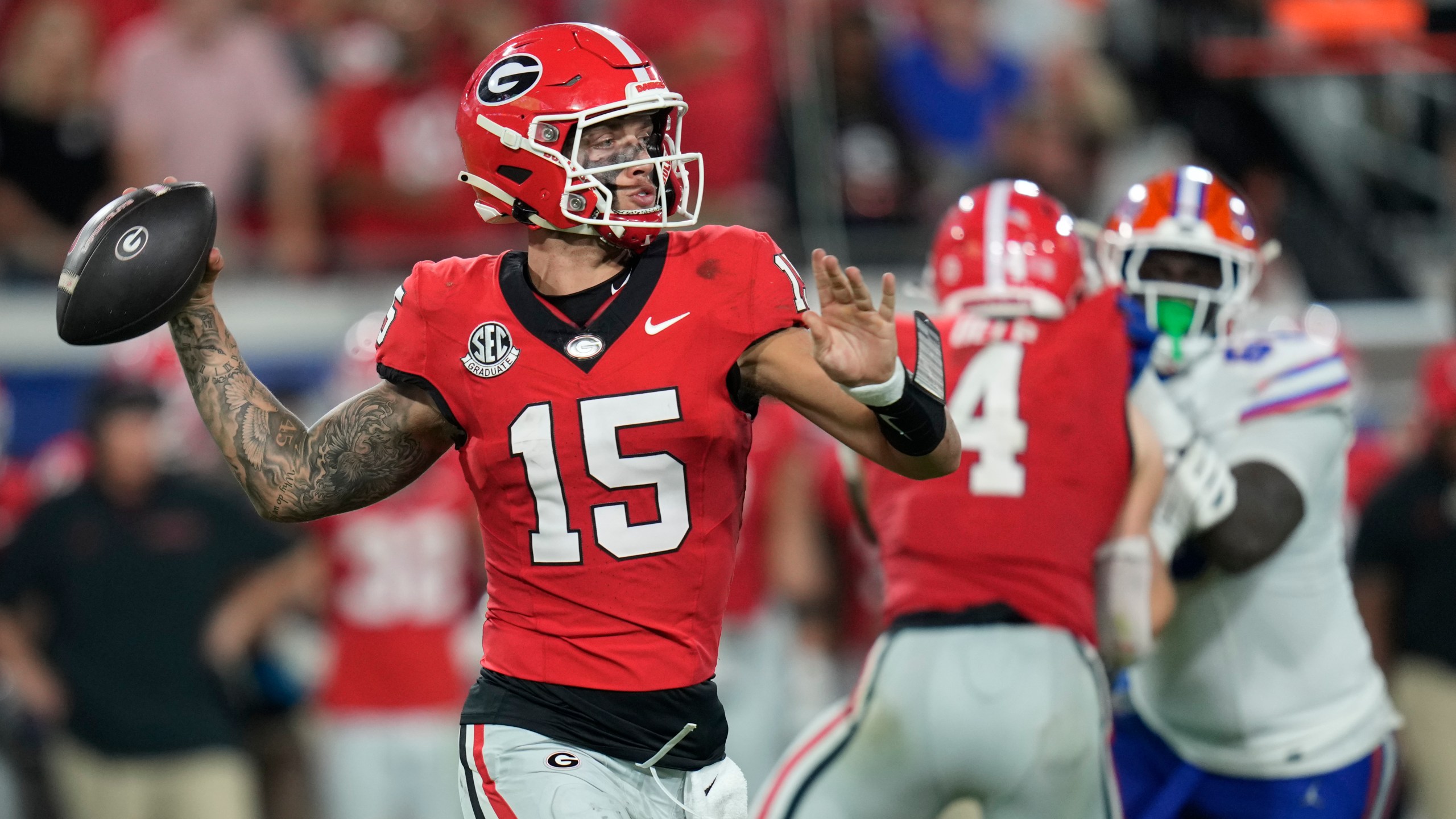 Georgia quarterback Carson Beck (15) throws a pass during the second half of an NCAA college football game against Florida, Saturday, Nov. 2, 2024, in Jacksonville, Fla. (AP Photo/John Raoux)