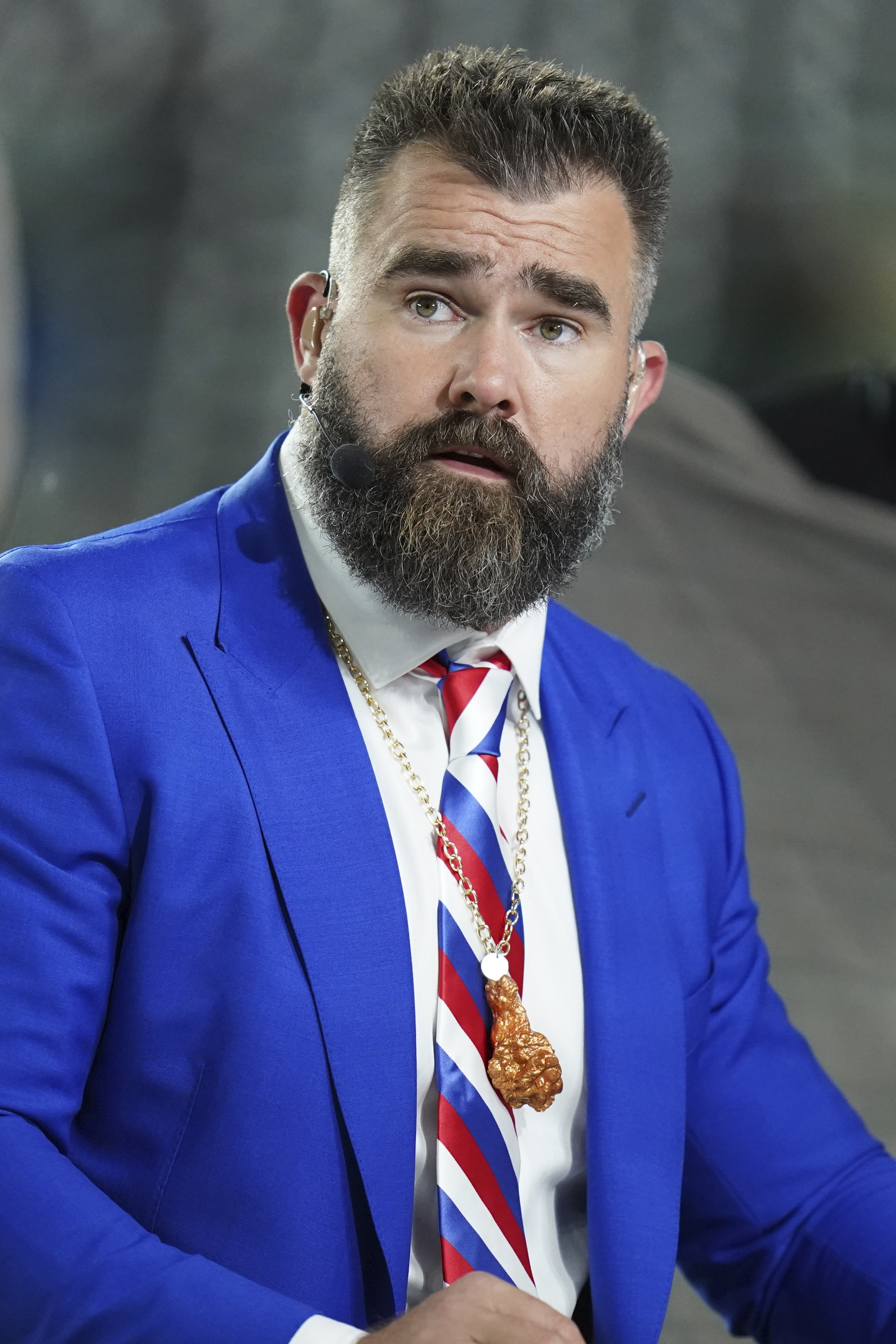 FILE - Former Philadelphia Eagles center Jason Kelce prepares for his ESPN debut as a Monday Night Football Analyst before an NFL football game between the Buffalo Bill and the New York Jets, Oct. 14, 2024 in East Rutherford, N.J. (AP Photo/Vera Nieuwenhuis, File)