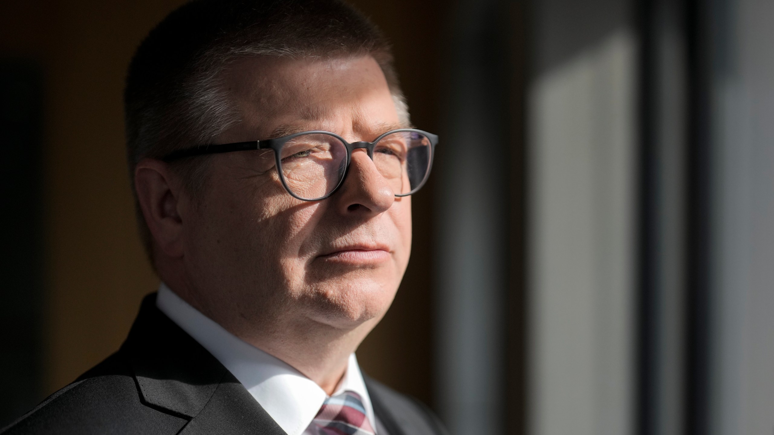 FILE - Thomas Haldenwang, head of the Federal Office for the Protection of the Constitution, poses for a photo after an interview with The Associated Press in Berlin, Germany, May 22, 2023. (AP Photo/Markus Schreiber), File