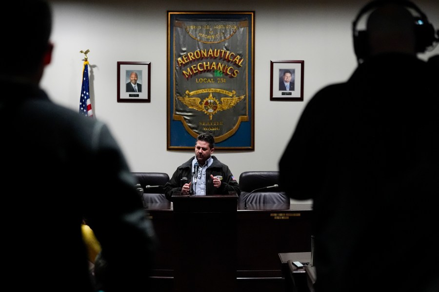 IAM District 751 president Jon Holden gives a press conference after announcing the union voted to accept a new contract offer from Boeing, Monday, Nov. 4, 2024, at their union hall in Seattle. (AP Photo/Lindsey Wasson)