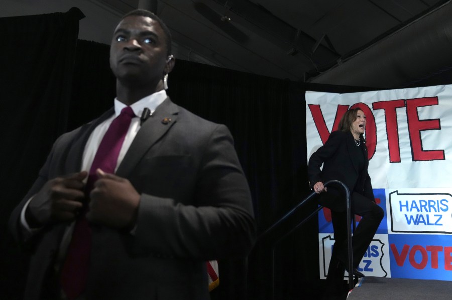 A member of the Secret Service looks on as Democratic presidential nominee Vice President Kamala Harris arrives to speak during a campaign event at Montage Mountain Resort in Scranton, Pa., Monday, Nov. 4, 2024. (AP Photo/Jacquelyn Martin)