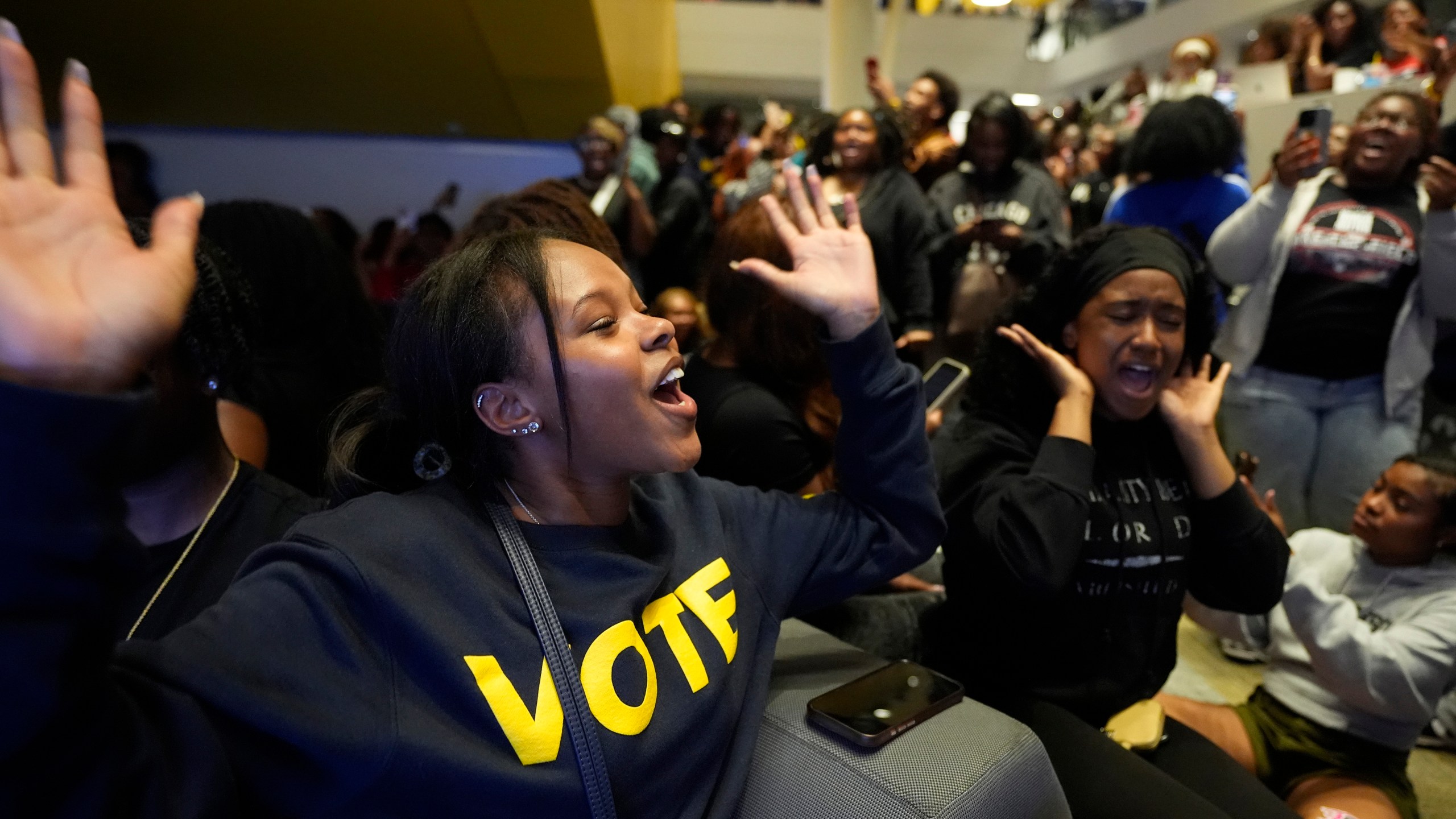 Zion Dawkins, an North Carolina A&T student, gathers with other students for an election night watch party, Tuesday, Nov. 5, 2024, in Greensboro, N.C. (AP Photo/George Walker IV)