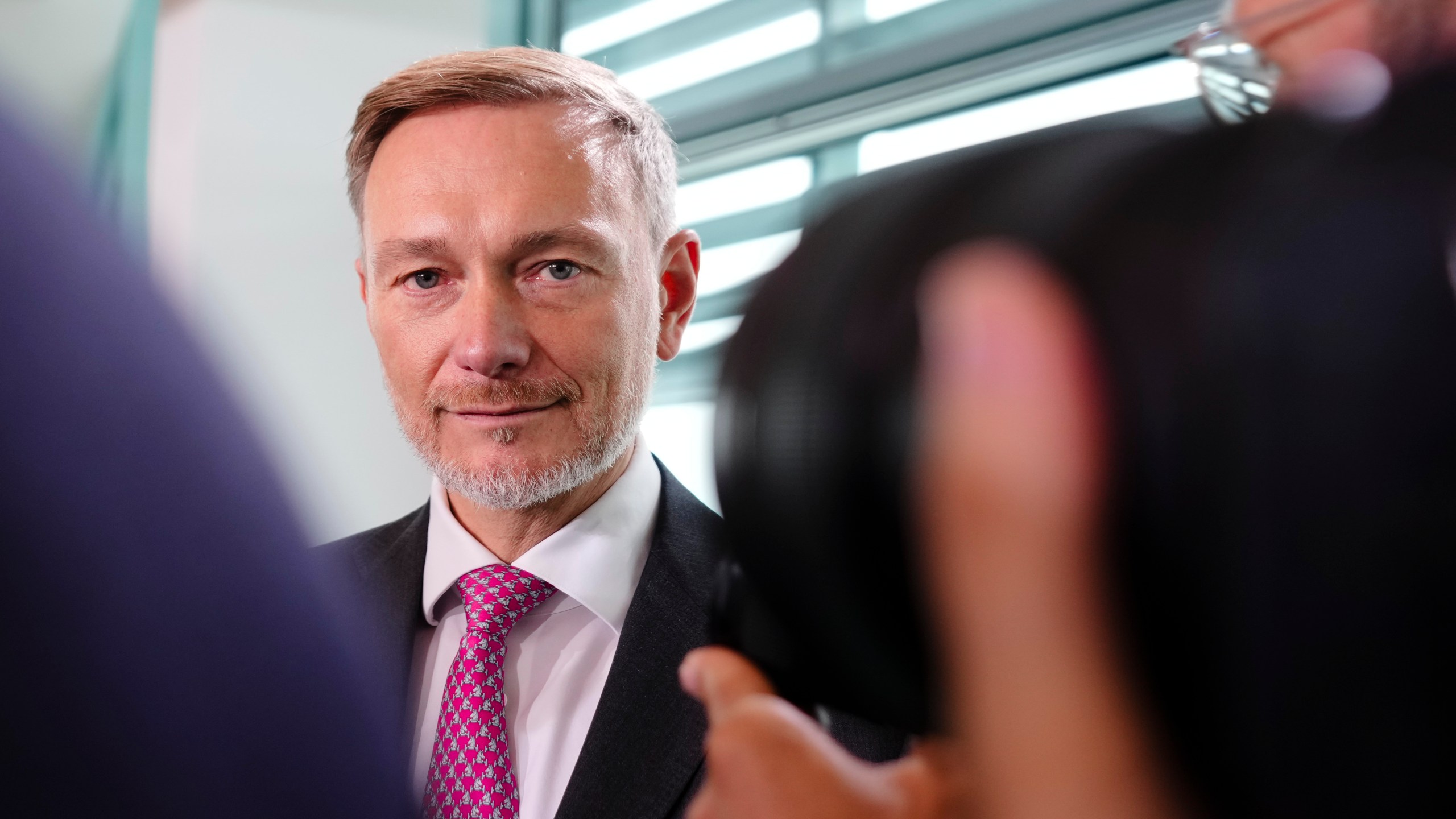 German Finance Minister Christian Lindner arrives for the weekly cabinet meeting at the chancellery in Berlin, Germany, Wednesday, Nov. 6, 2024. (AP Photo/Markus Schreiber)