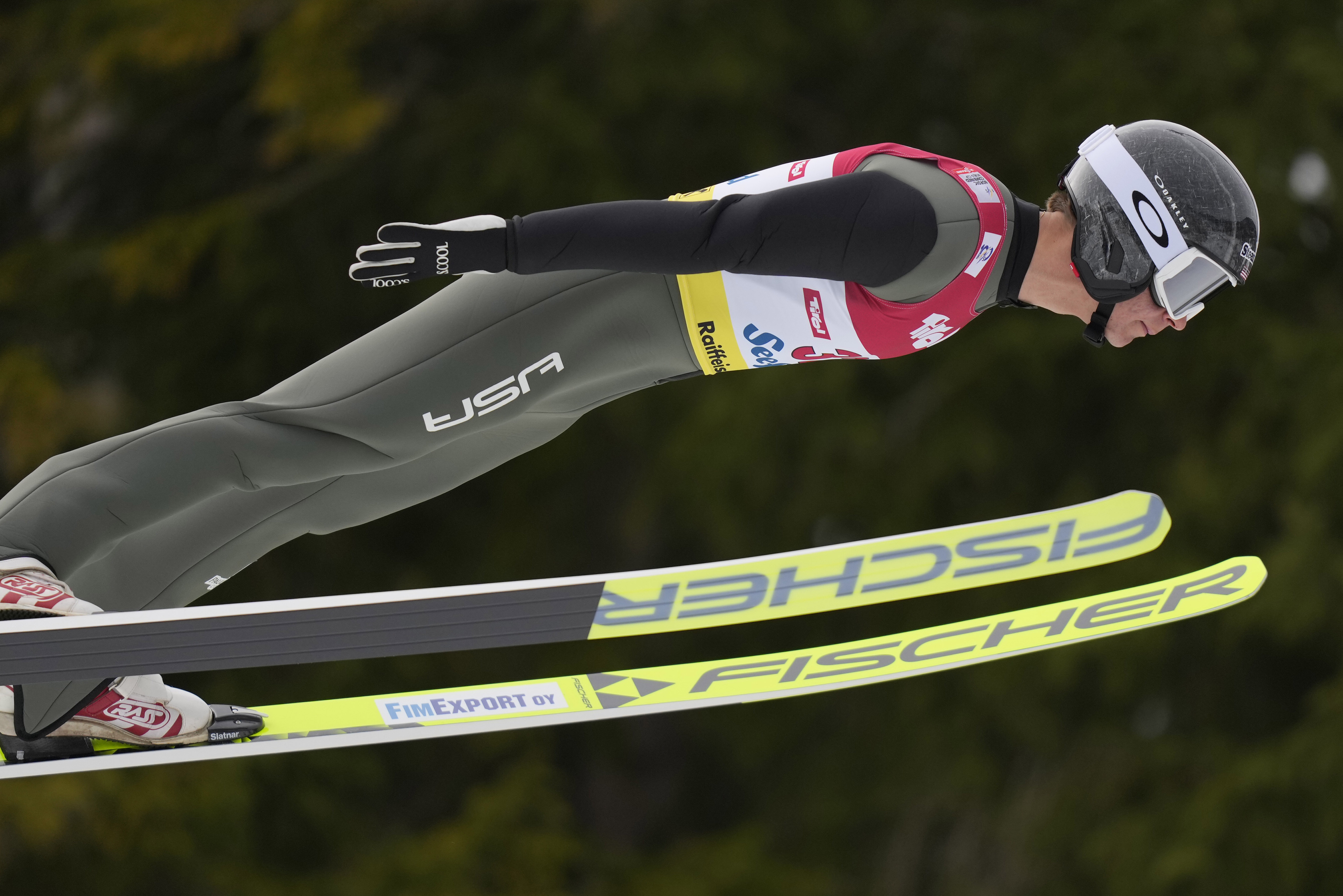 FILE - U.S. Niklas Malacinski competes during the men's Individual Gundersen Ski jumping at the Nordic Combined Triple World Cup in Seefeld, Austria, Feb. 2, 2024. (AP Photo/Matthias Schrader, File)