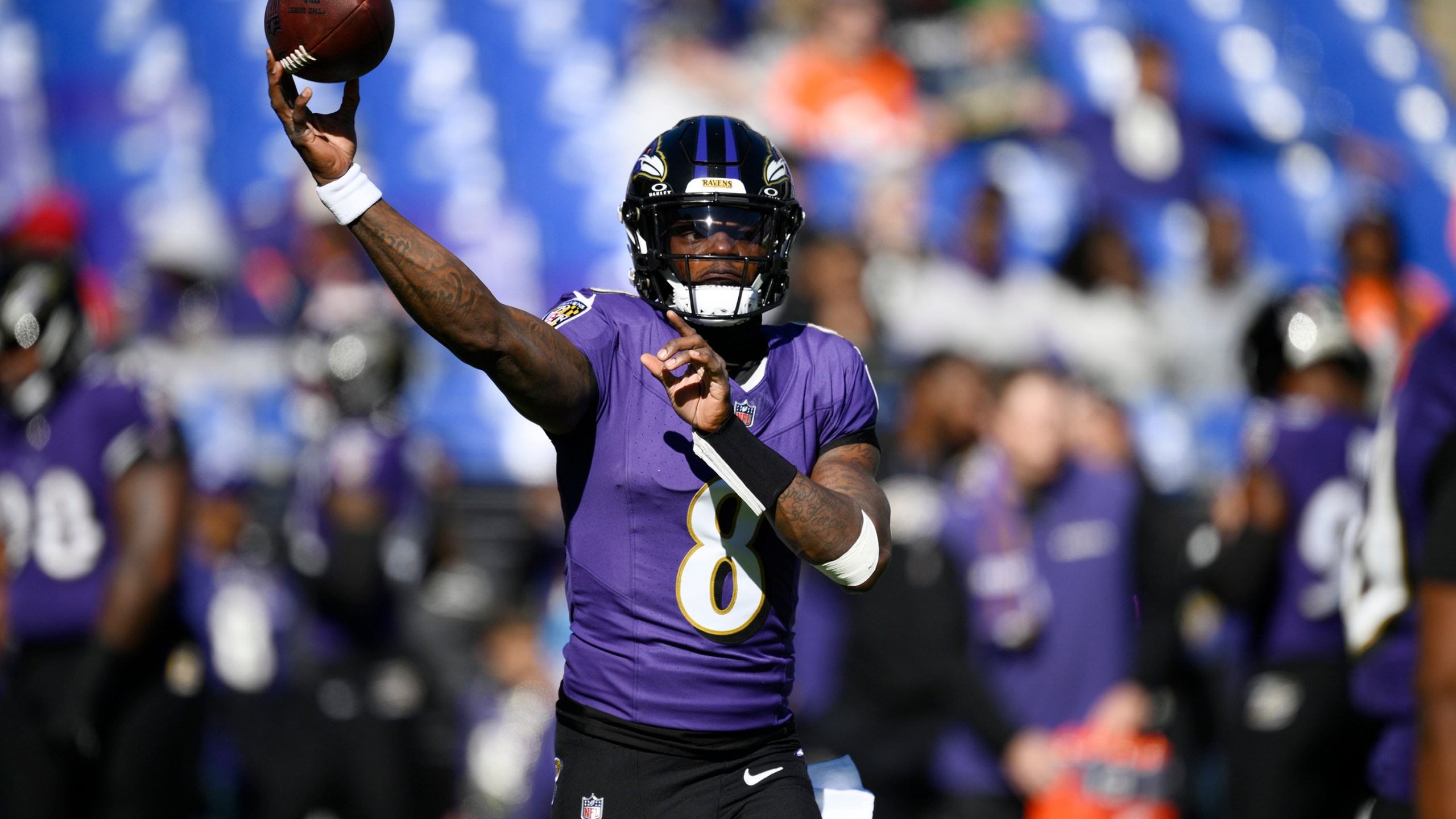 Baltimore Ravens quarterback Lamar Jackson warms up before an NFL football game against the Denver Broncos Sunday, Nov. 3, 2024, in Baltimore. (AP Photo/Nick Wass)