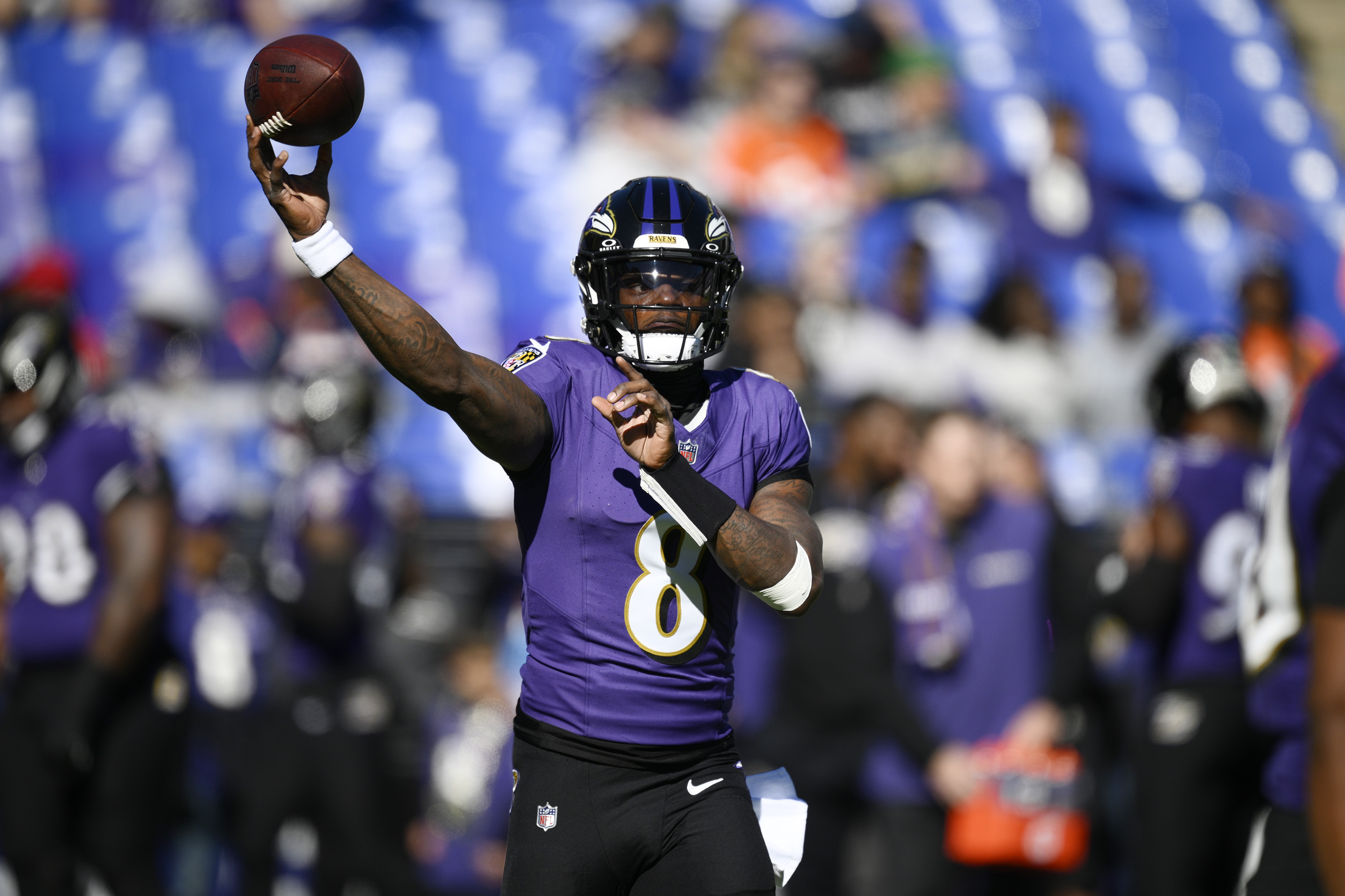 Baltimore Ravens quarterback Lamar Jackson warms up before an NFL football game against the Denver Broncos Sunday, Nov. 3, 2024, in Baltimore. (AP Photo/Nick Wass)