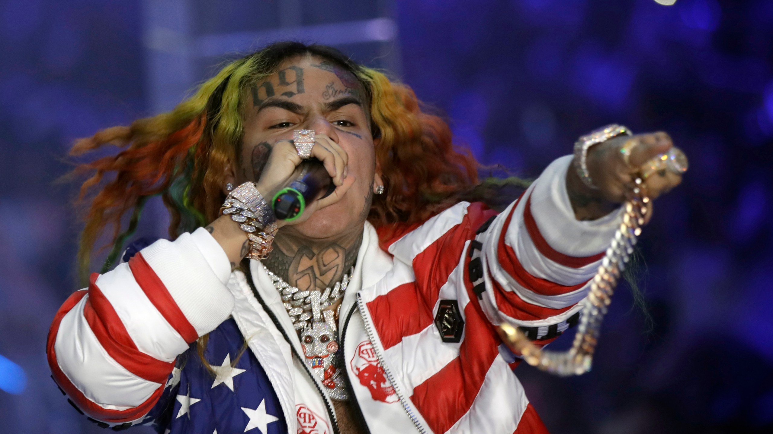 FILE- Rapper Daniel Hernandez, known as Tekashi 6ix9ine, performs during the Philipp Plein women's 2019 Spring-Summer collection, unveiled during the Fashion Week in Milan, Italy, Sept. 21, 2018. (AP Photo/Luca Bruno, File)