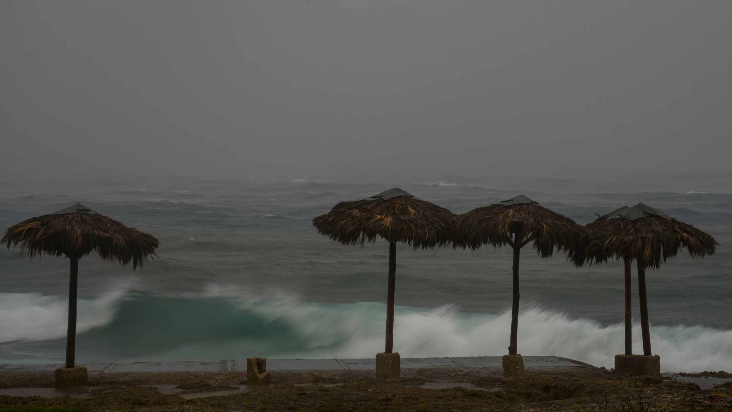 Waves break on the beach during the passing of Hurricane Rafael in Havana, Cuba, Wednesday, Nov. 6, 2024. (AP Photo/Ramon Espinosa)