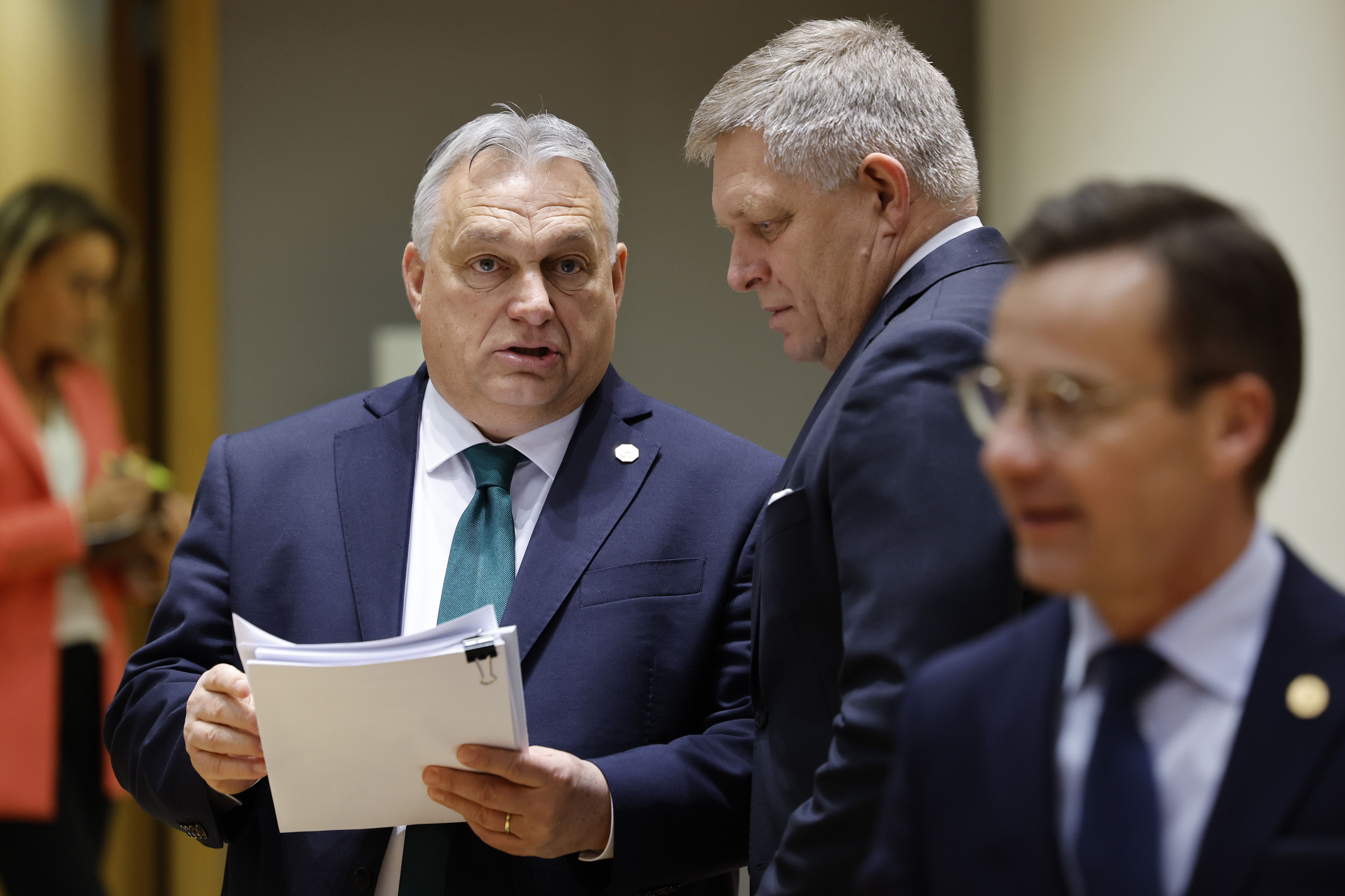 FILE - Slovakia's Prime Minister Robert Fico, right, talks to Hungary's Prime Minister Viktor Orban during a round table meeting at an EU summit in Brussels, on Feb. 1, 2024. (AP Photo/Geert Vanden Wijngaert, File)