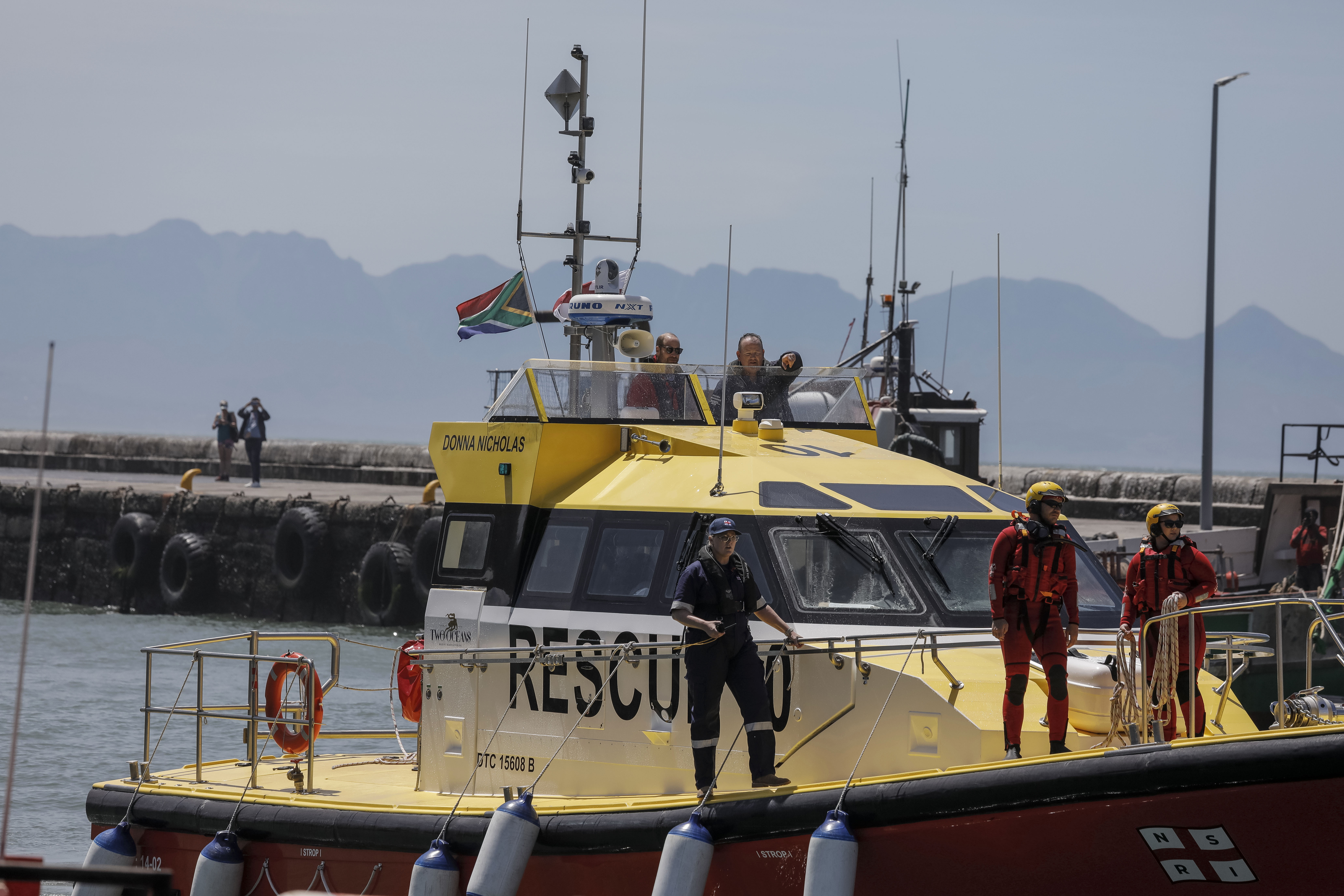 Britain's Prince William, the Prince of Wales, arrives on board a National Sea Rescue Institute (NSRI) boat to meet 2023 Earthshot finalist ABALOBI, at Kalk Bay Harbour, near Cape Town, Thursday, Nov. 7, 2024. (Gianluigi Guercia/Pool Photo via AP)