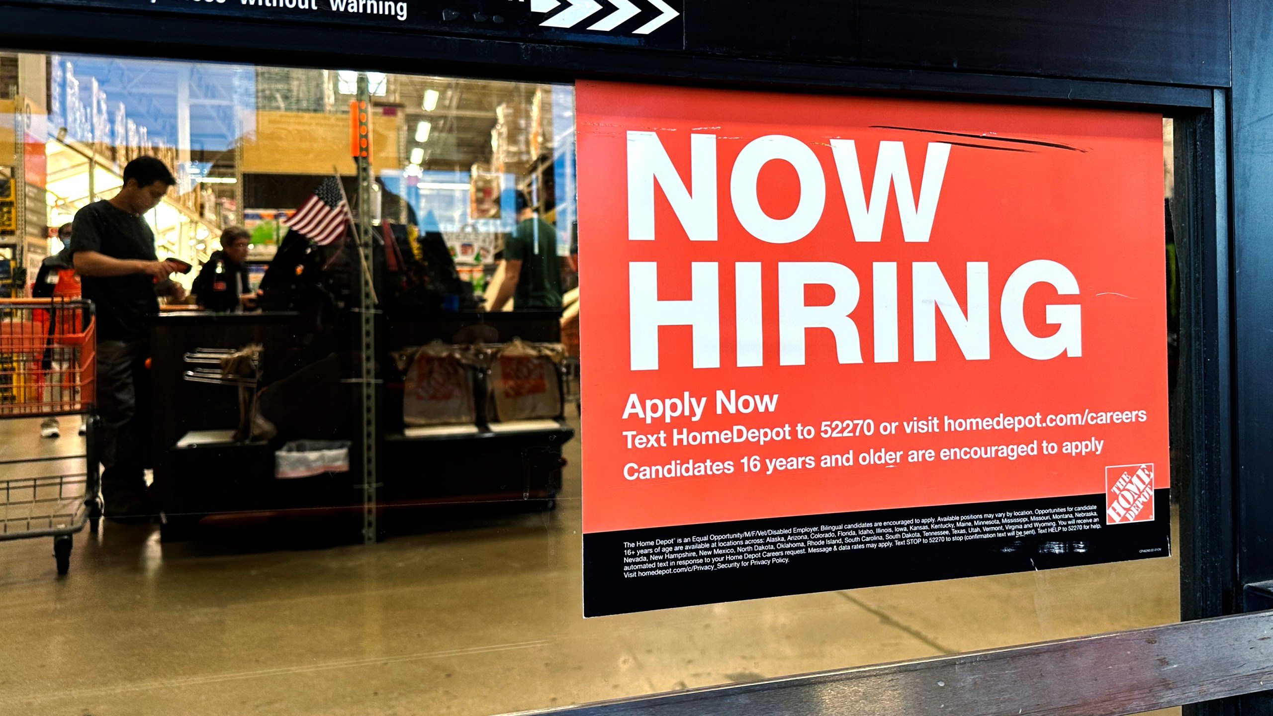 A hiring sign is displayed at a retail store in Mount Prospect, Ill., Saturday, Nov. 2, 2024. (AP Photo/Nam Y. Huh)