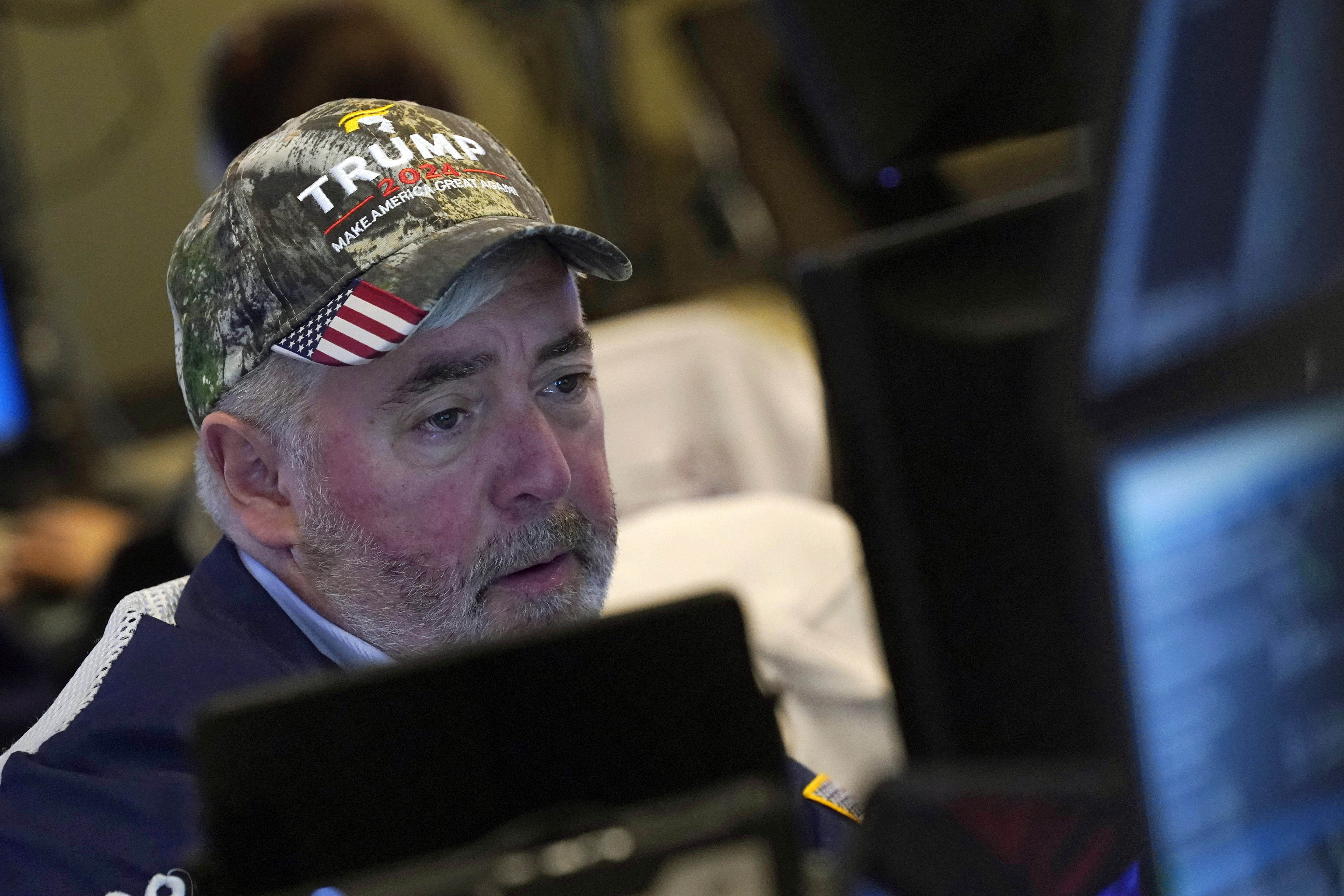 Trader Edward McCarthy works on the floor of the New York Stock Exchange, Wednesday, Nov. 6, 2024. (AP Photo/Richard Drew)