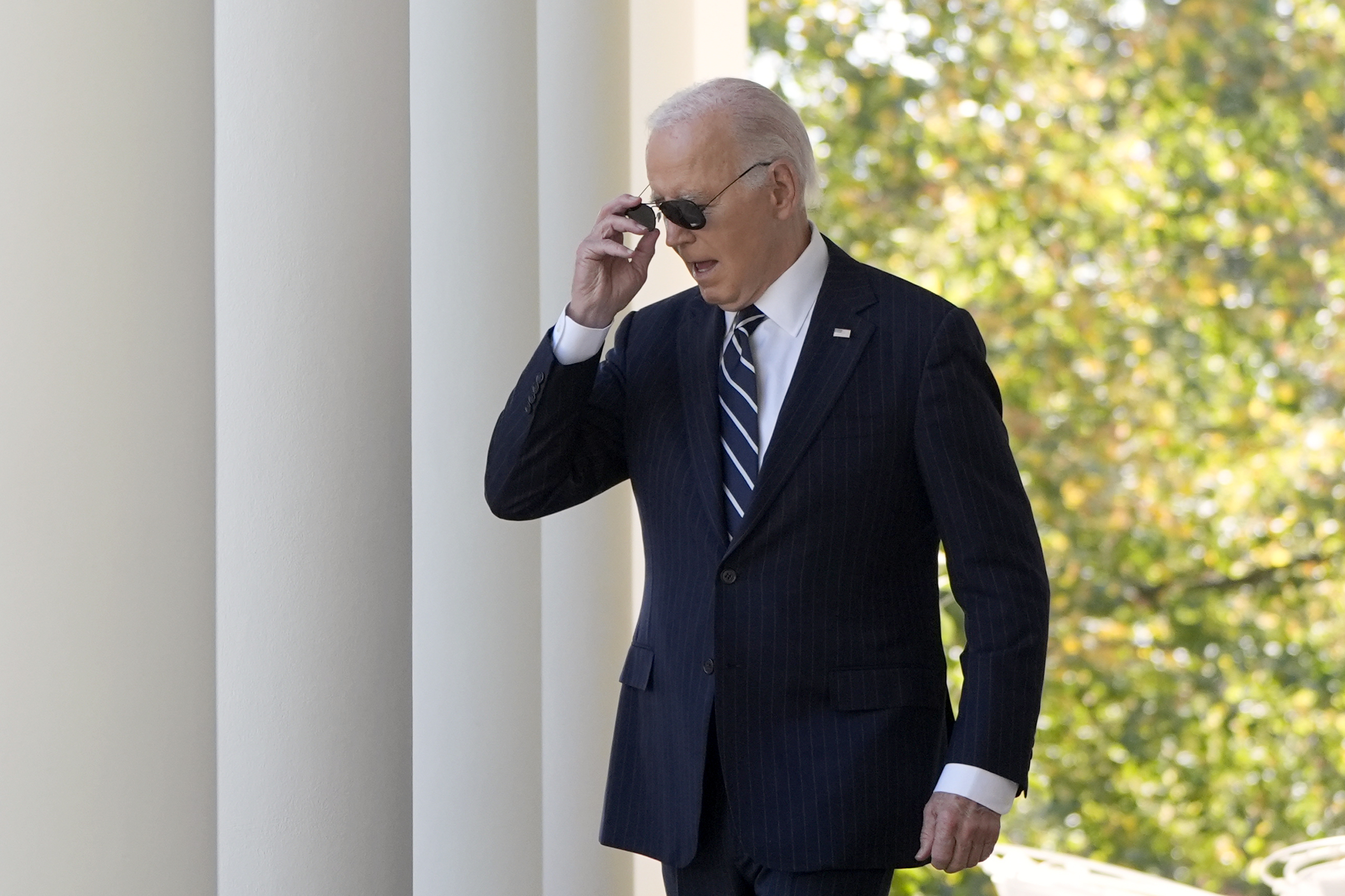 President Joe Biden walks to speak in the Rose Garden of the White House in Washington, Thursday, Nov. 7, 2024. (AP Photo/Mark Schiefelbein)