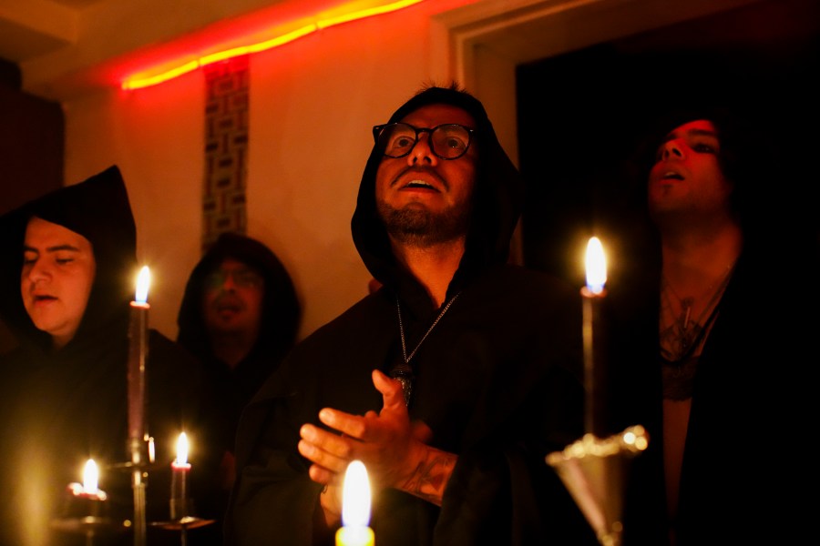 Azazel, The Temple of Satan: Satanists and Luciferians of Chile founder, takes part in a Celtic pagan celebration, in Santiago, Thursday, Oct. 31, 2024. (AP Photo/Esteban Felix)