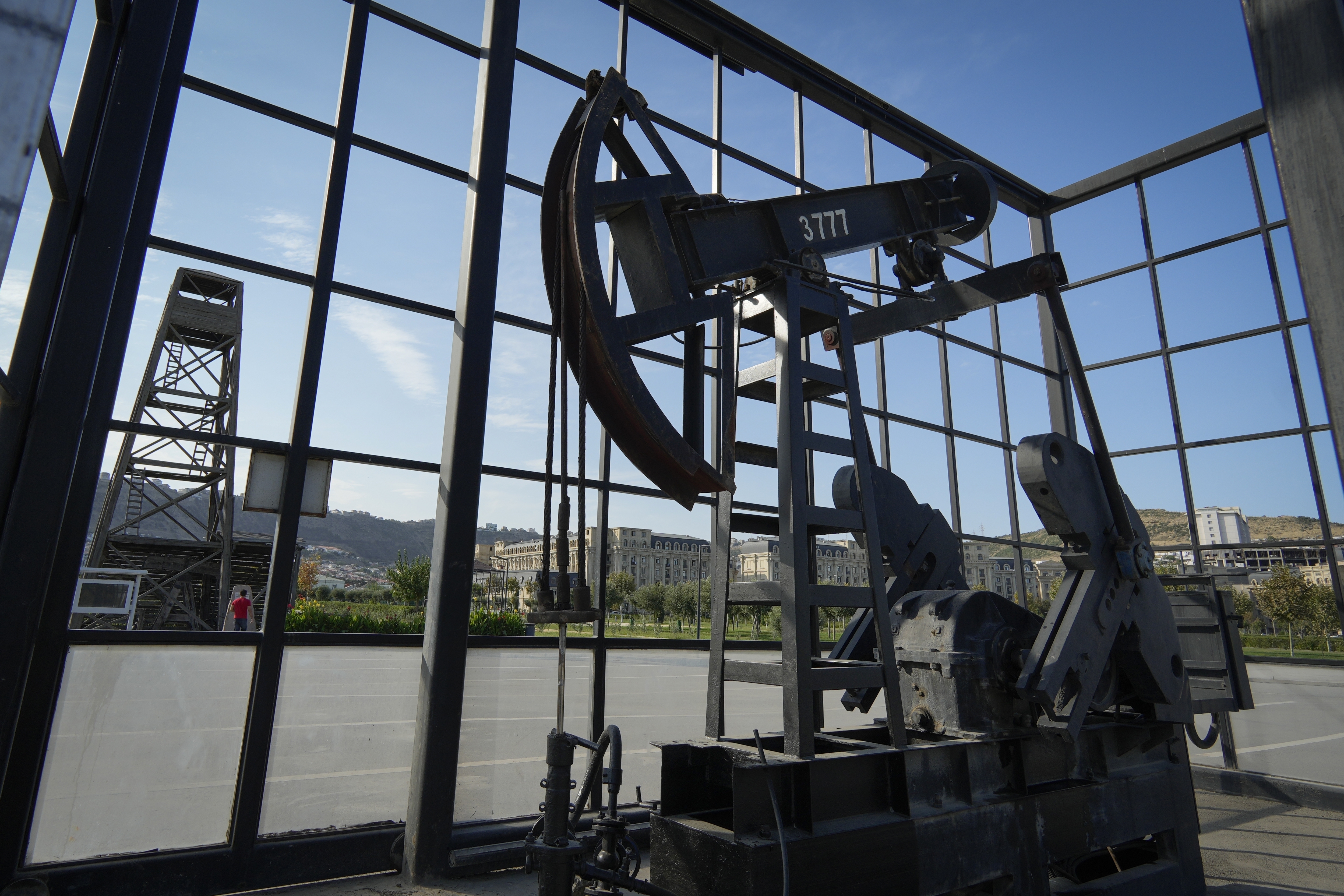 A pumpjack operates in Baku, Azerbaijan, Monday, Sept. 16, 2024. (AP Photo/Sergei Grits)