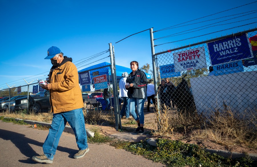 Voters arrive to a polling station on the Navajo Nation in Fort Defiance, Ariz., on Election Day, Tuesday, Nov. 5, 2024. (AP Photo/Andres Leighton)