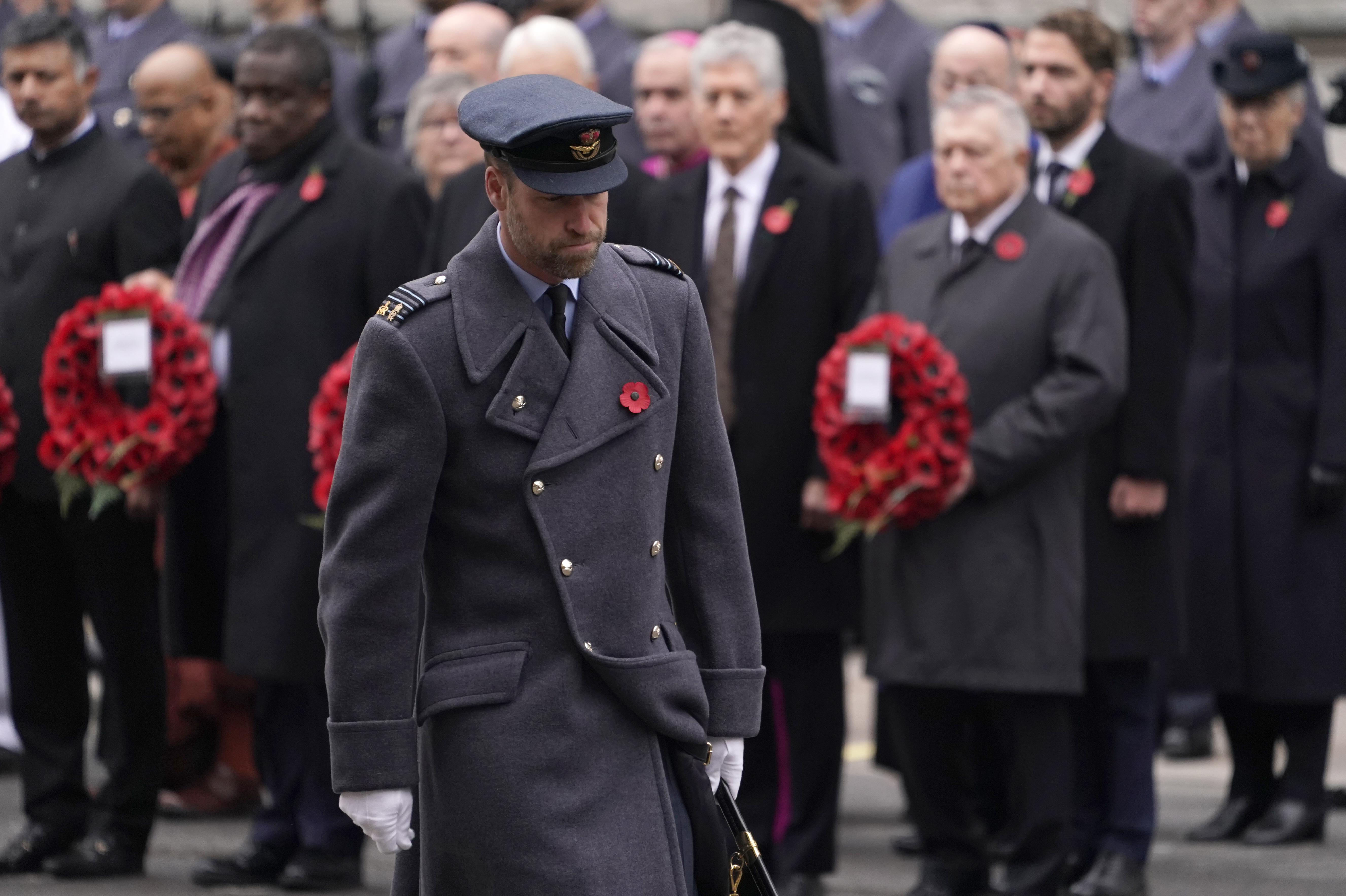 Britain's Prince William returns to his position after laying a wreath during the Remembrance Sunday Service at the Cenotaph in London, Sunday, Nov. 10, 2024. (AP Photo/Alberto Pezzali, Pool)