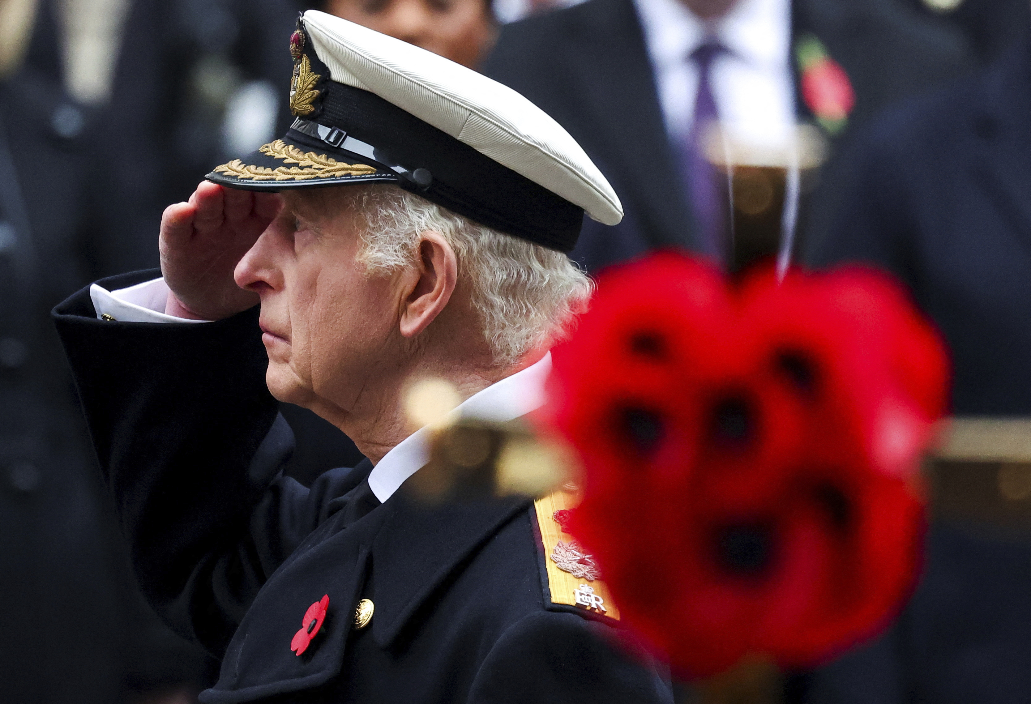 Britain's King Charles attends the Remembrance Sunday ceremony at The Cenotaph in London, England, Sunday, Nov. 10, 2024. (Toby Melville/Pool Photo via AP)